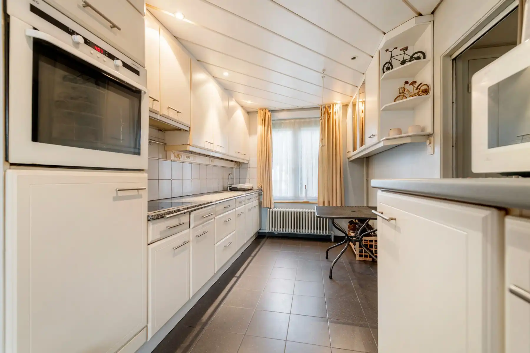 Gezinswoning met 3 slaapkamers en garage in Sint-Michiels foto 5