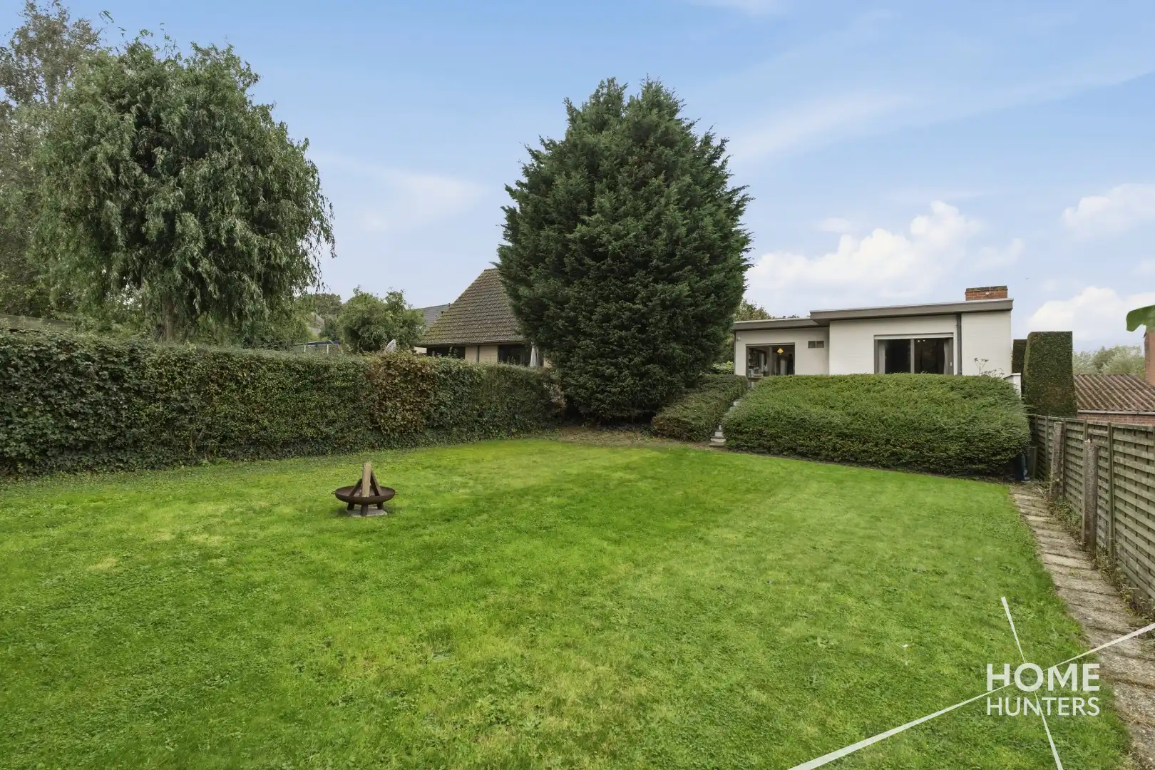 RUSTIG GELEGEN BUNGALOW MET RUIME TUIN EN VEELZIJDIGE KELDERRUIMTE foto 39