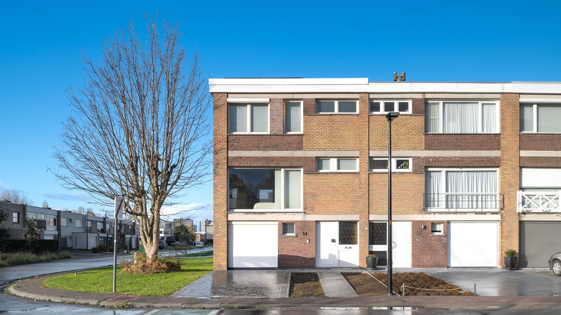 Halfopen woning met 2 garages en tuin te Heist foto 22