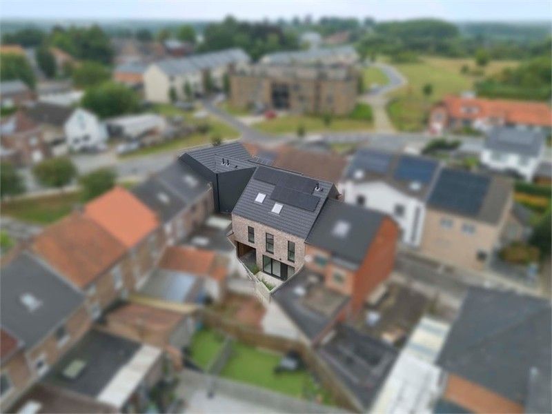 KNAPPE NIEUWBOUWWONING IN HET CENTRUM VAN BORGLOON (MOGELIJKHEID AANKOOP 6% BTW) foto 7
