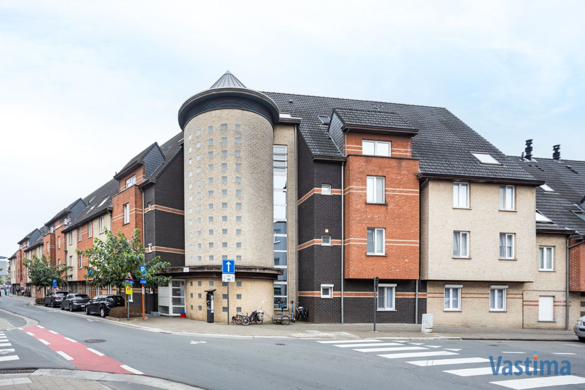 Instapklaar gelijkvloers appartement met tuin en garage foto 1