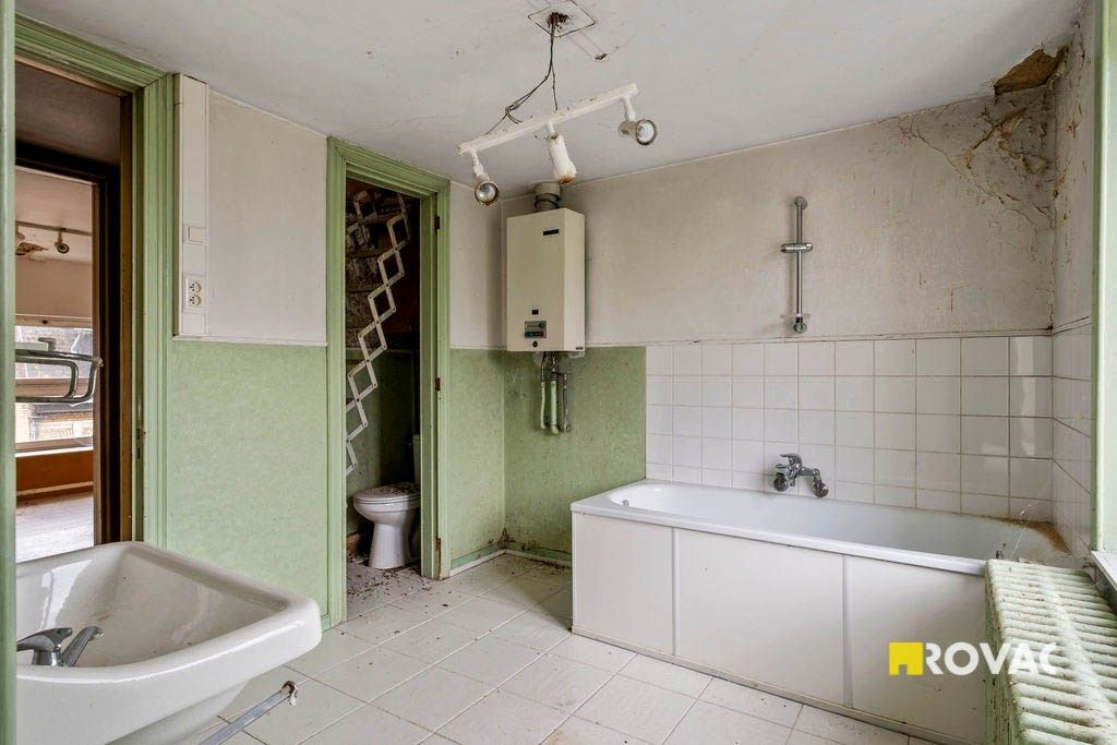 Te renoveren handelspand met woonst in hartje Izegem foto 27