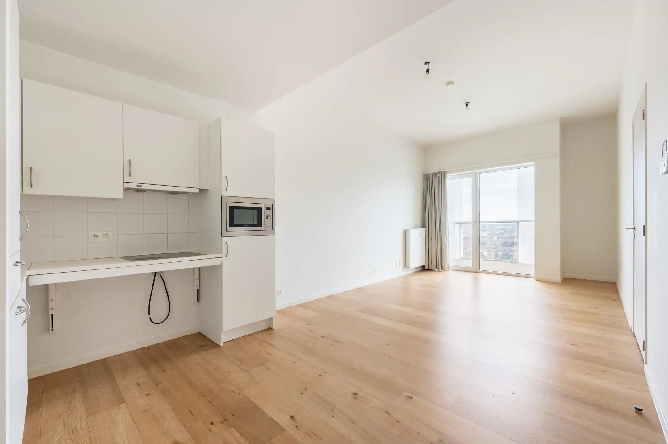 Lichtrijk appartement met terras en EPC A foto 4