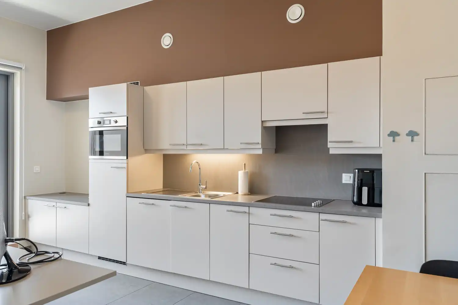 Modern en energiezuinig(A-label) appartement met 1 slaapkamer, een terras, een autostaanplaats, een kelder en een fietsenstalling te centrum Leuven! foto 9