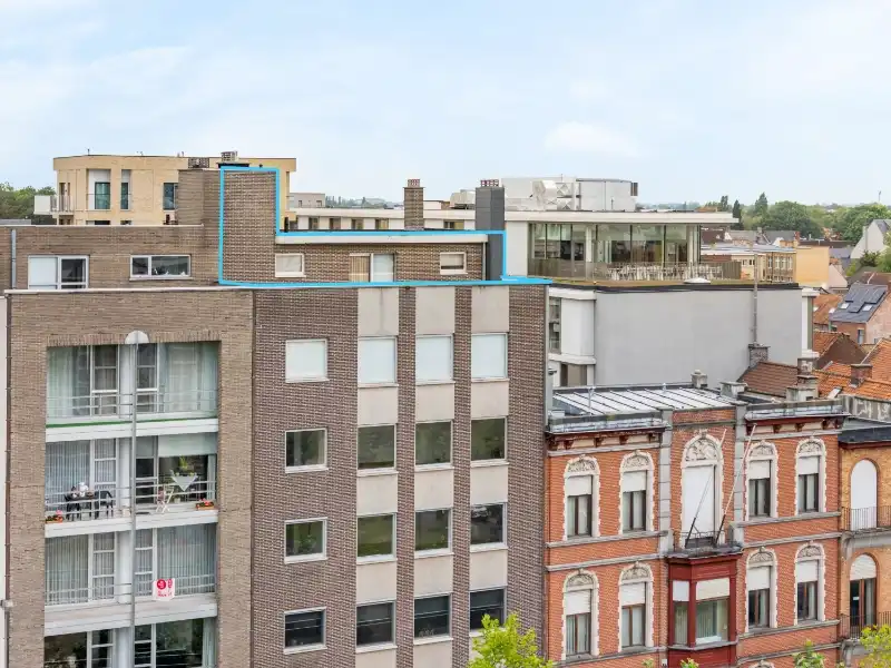 Roeselare-stadskern. PENTHOUSE op 6de verdieping aan het Coninckplein gelegen, met 2 slaapkamers, ochtendterras en avondterras. Een pareltje met unieke ligging ! foto 21