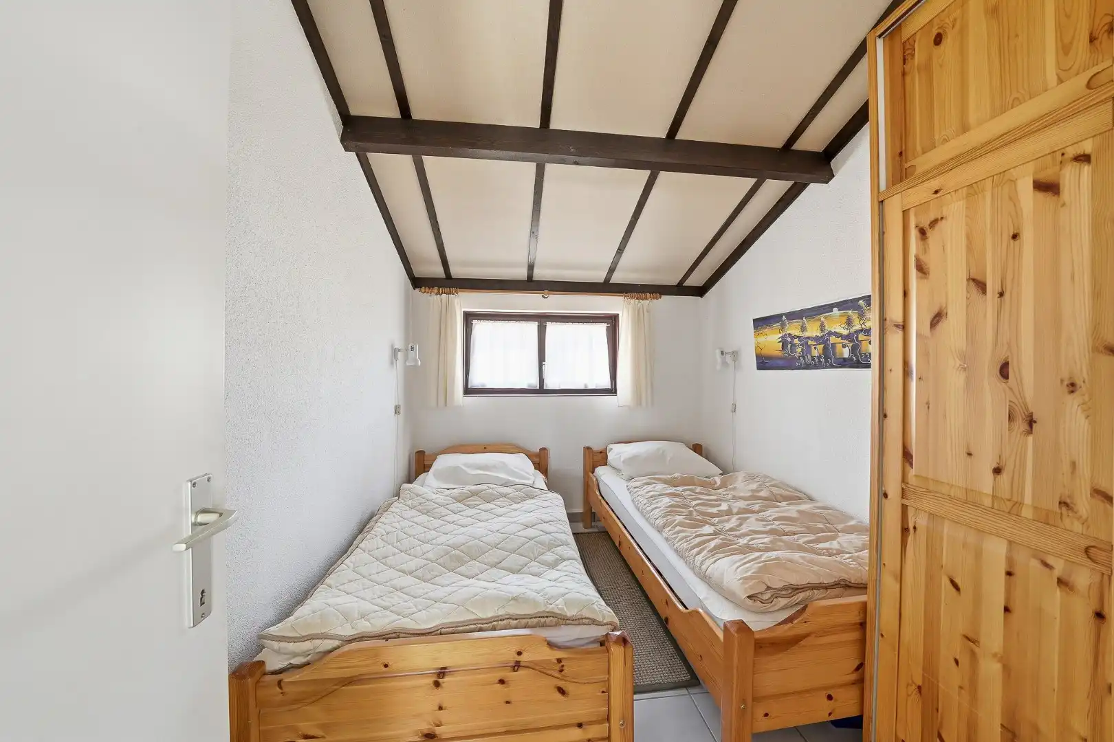 Instapklare vakantiewoning met zonnige tuin en 2 slaapkamers foto 8