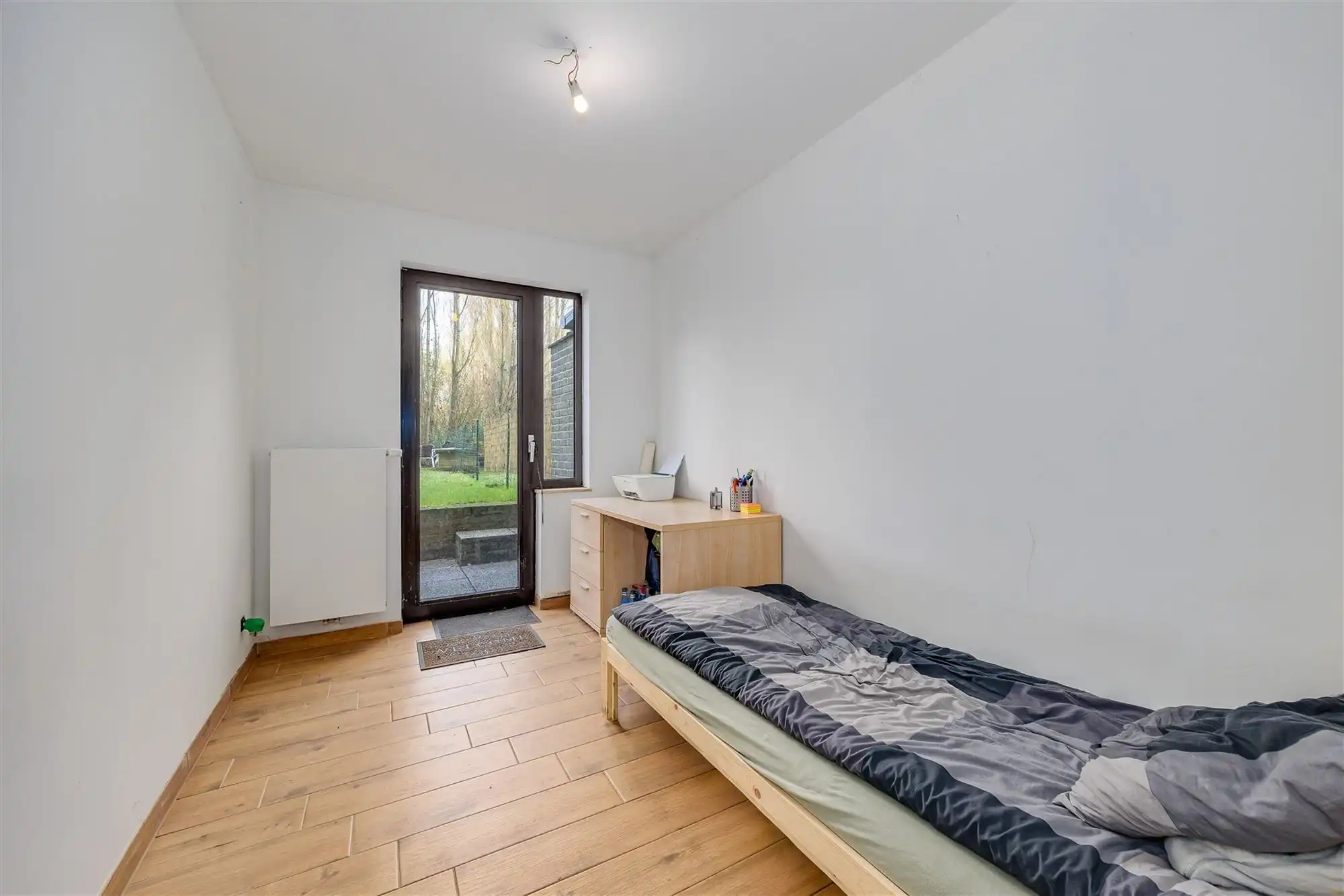 Instapklaar 2 slaapkamer appartement met gezellige tuin foto 8