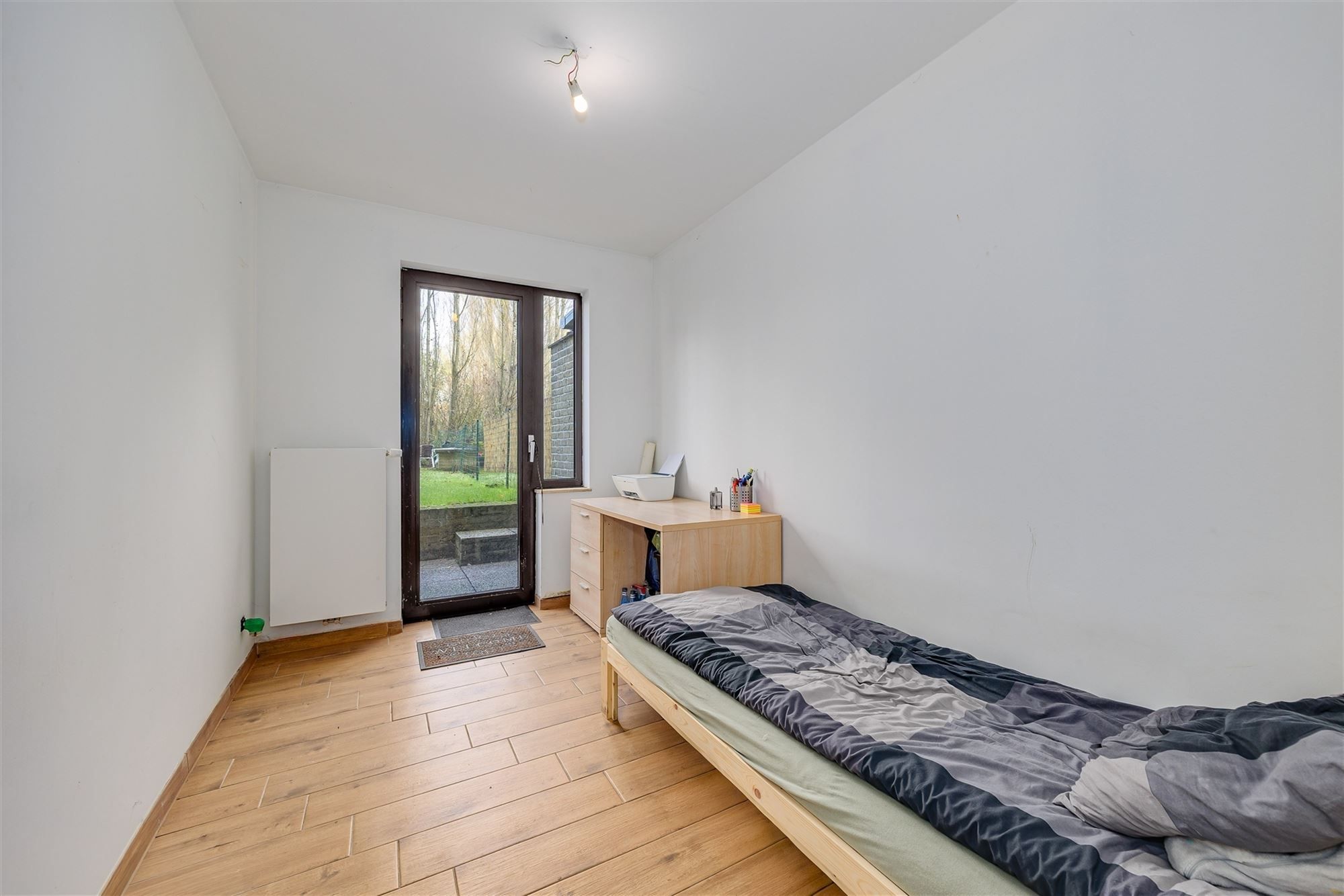 Instapklaar 2 slaapkamer appartement met gezellige tuin foto 8