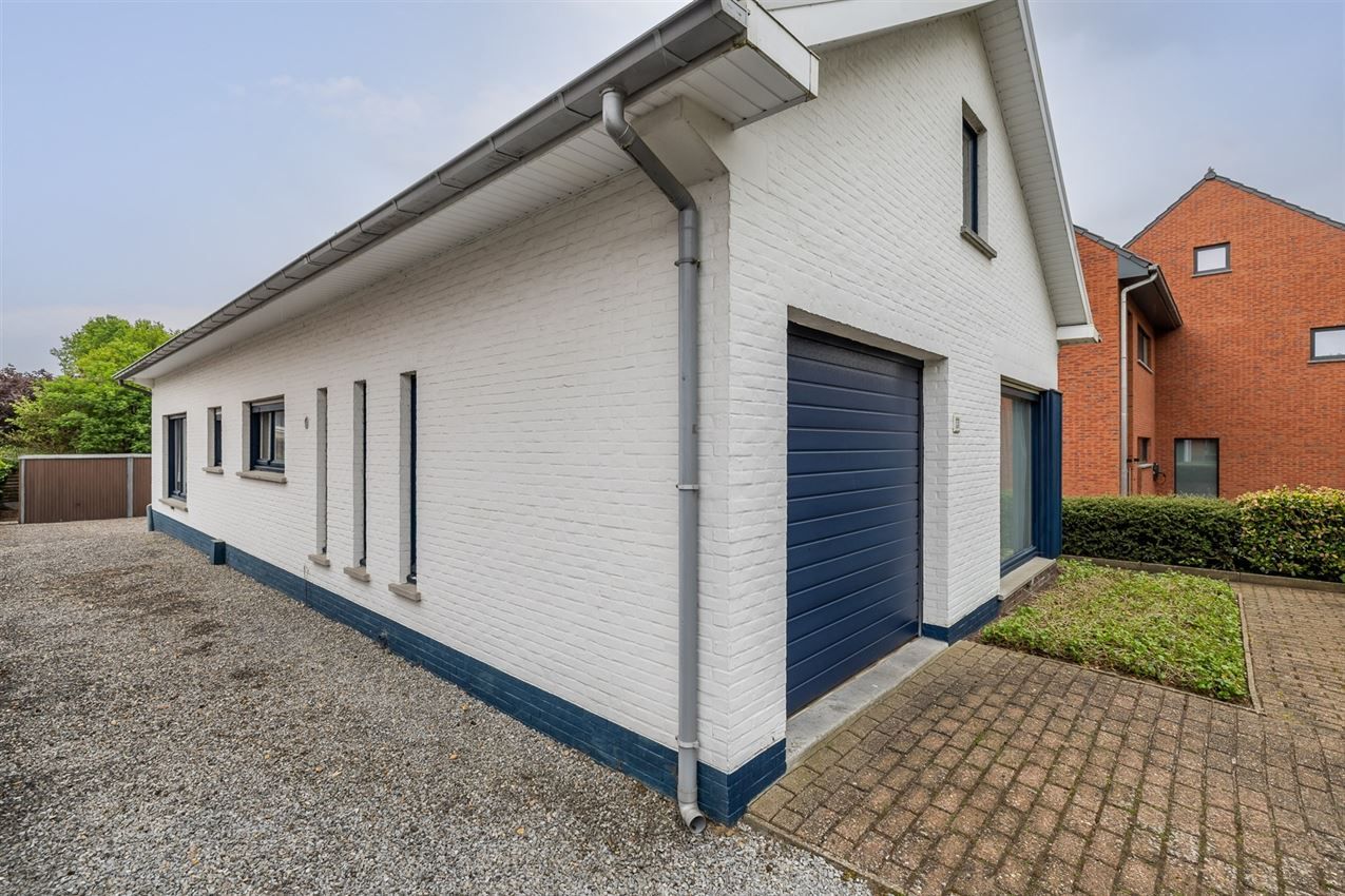 Te renoveren woning met 4 slk. in het hart van Averbode foto 33