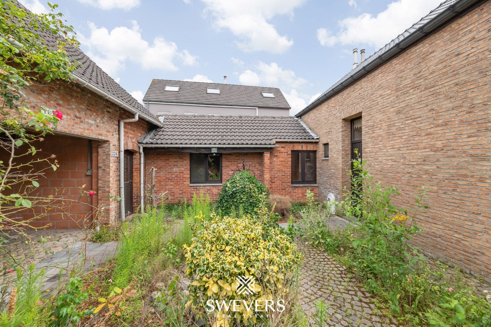 Karaktervolle woonst met renovatiepotentieel te Beverlo foto 26