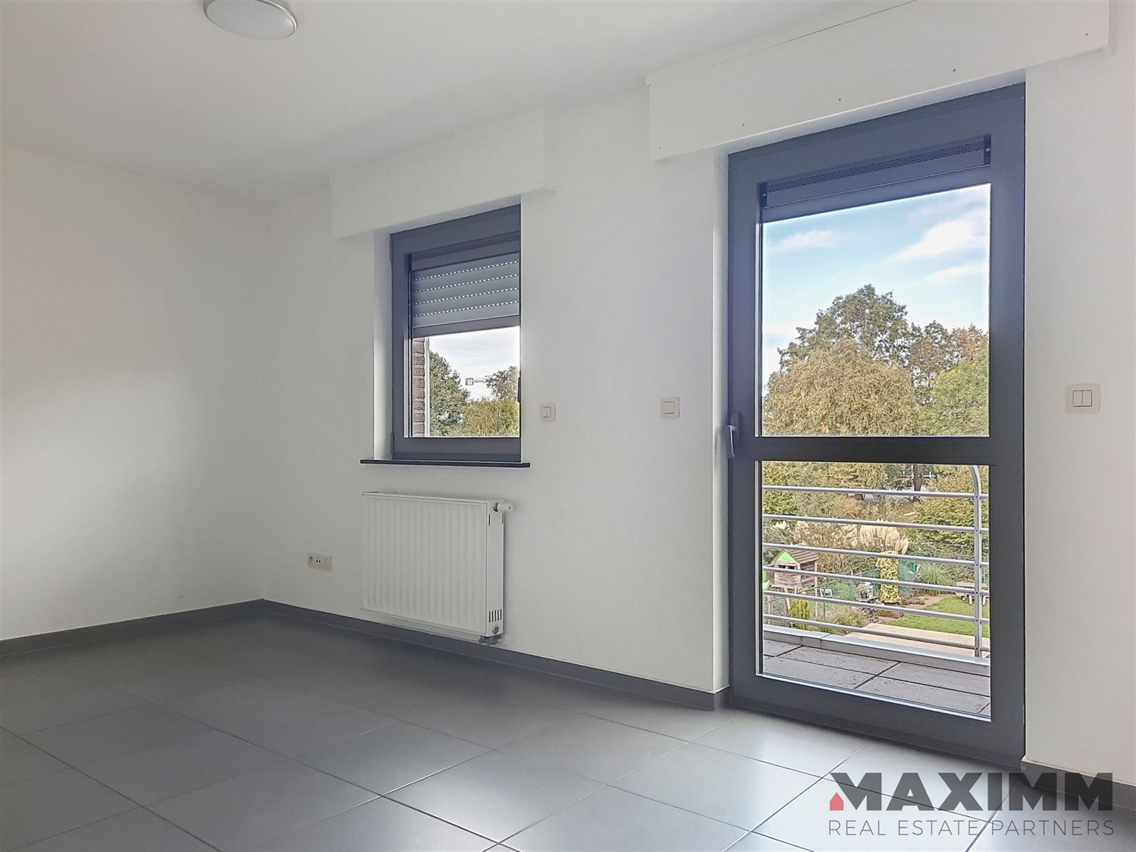 duplex woonst, 110m², terras voor- en achterzijde, garagebox en berging. foto 8