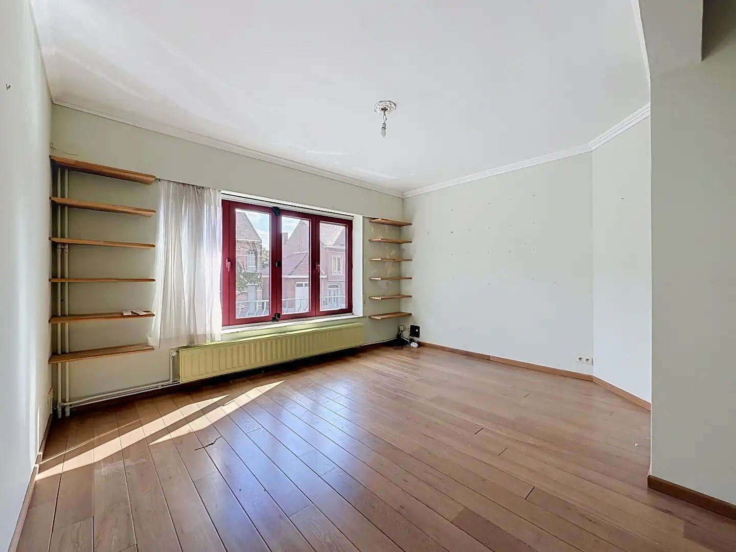 Ruime bel-etagewoning met 4 slaapkamers en grote zuidoostgerichte tuin in Leuven foto 5