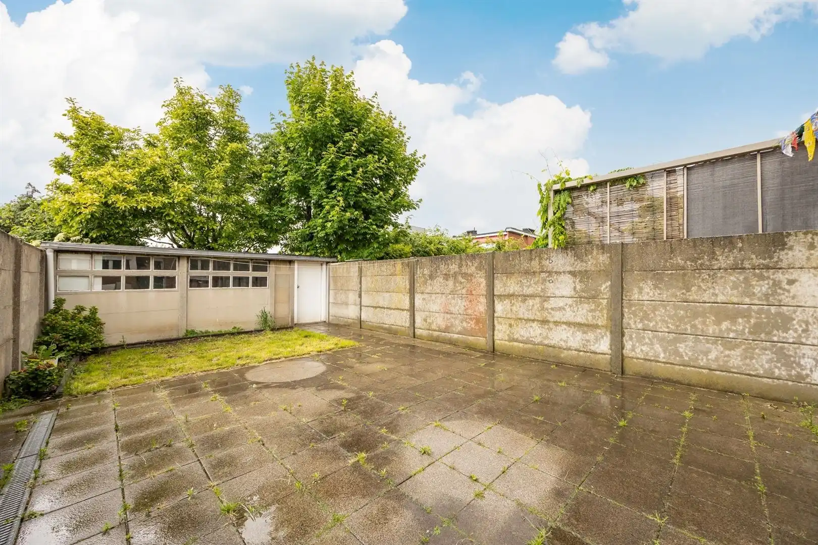 Ruime gezinswoning met zonnige tuin en renovatiepotentieel foto 26