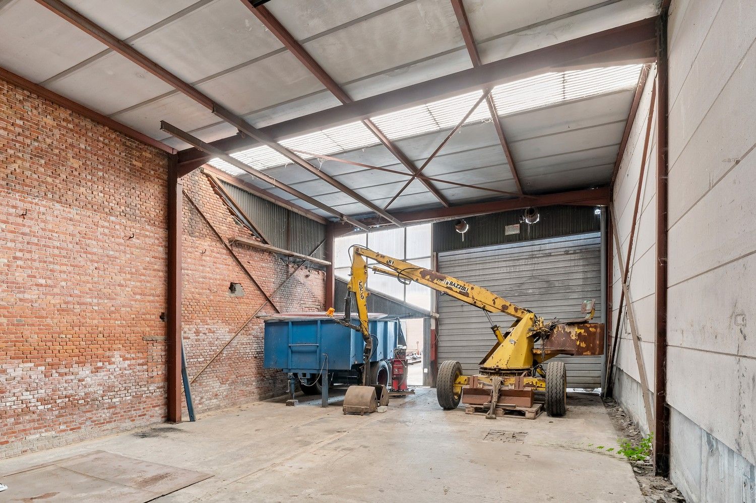 Ruime open bebouwing met loods en garages op ca. 1,7 ha – landelijke ligging in agrarisch gebied. foto 21