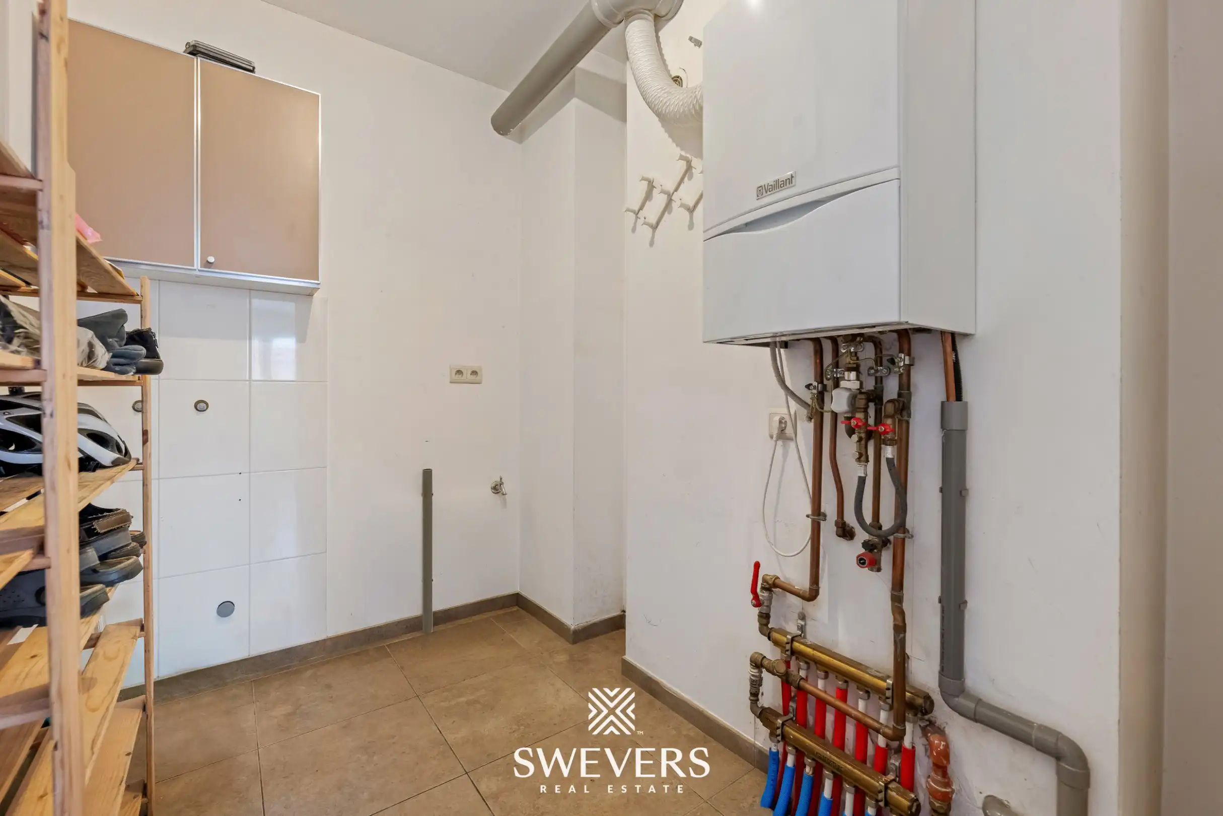 Ruim gelijkvloers appartement met tuin en ondergrondse autostaanplaats foto 12