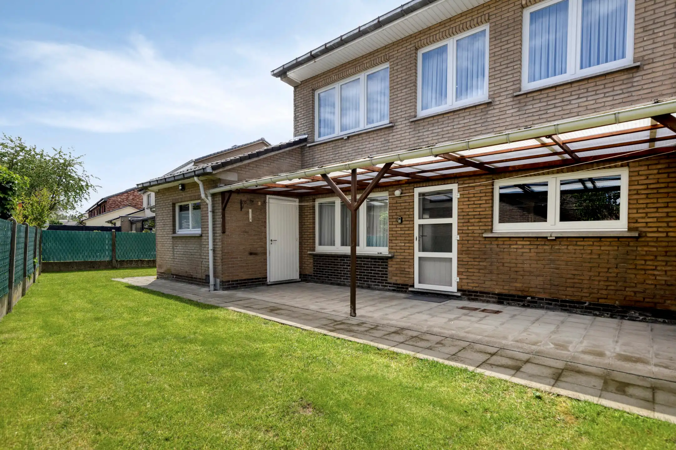 Ruime 3-gevelwoning met 4 slaapkamers en tuin te koop foto 14