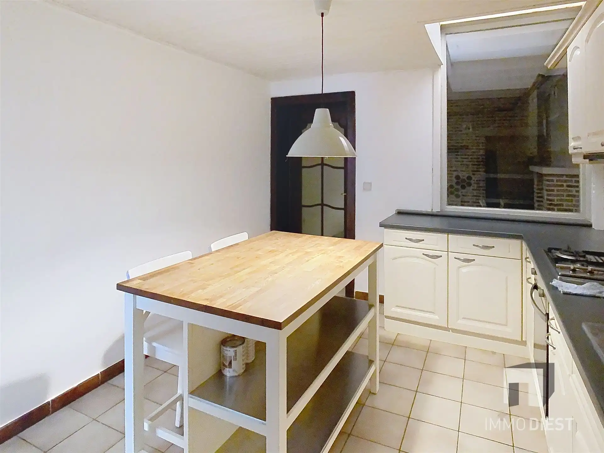 Gezellige rijwoning met terras en tuin foto 8