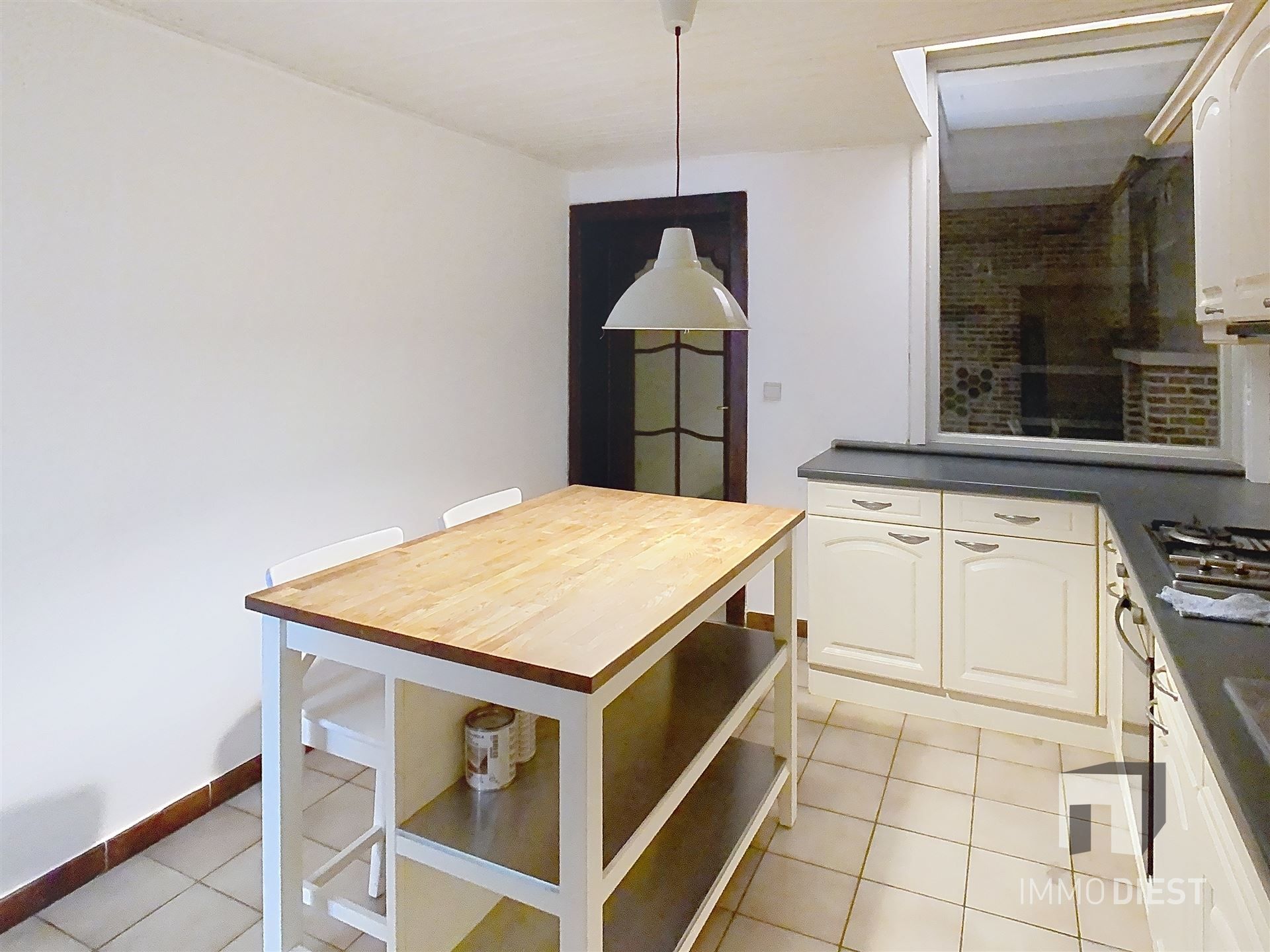 Gezellige rijwoning met terras en tuin foto 8