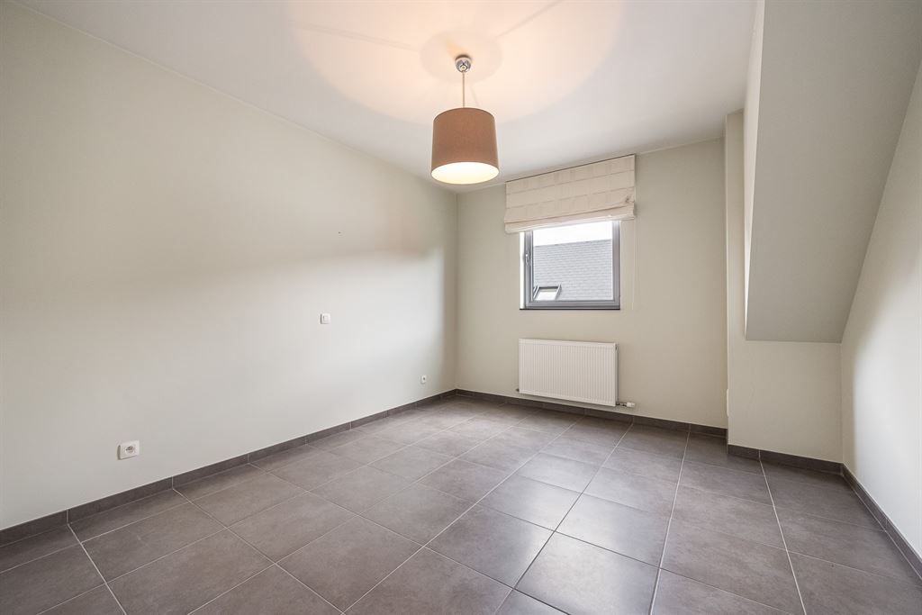 Zeer ruim duplexappartement in hartje Herent! foto 13