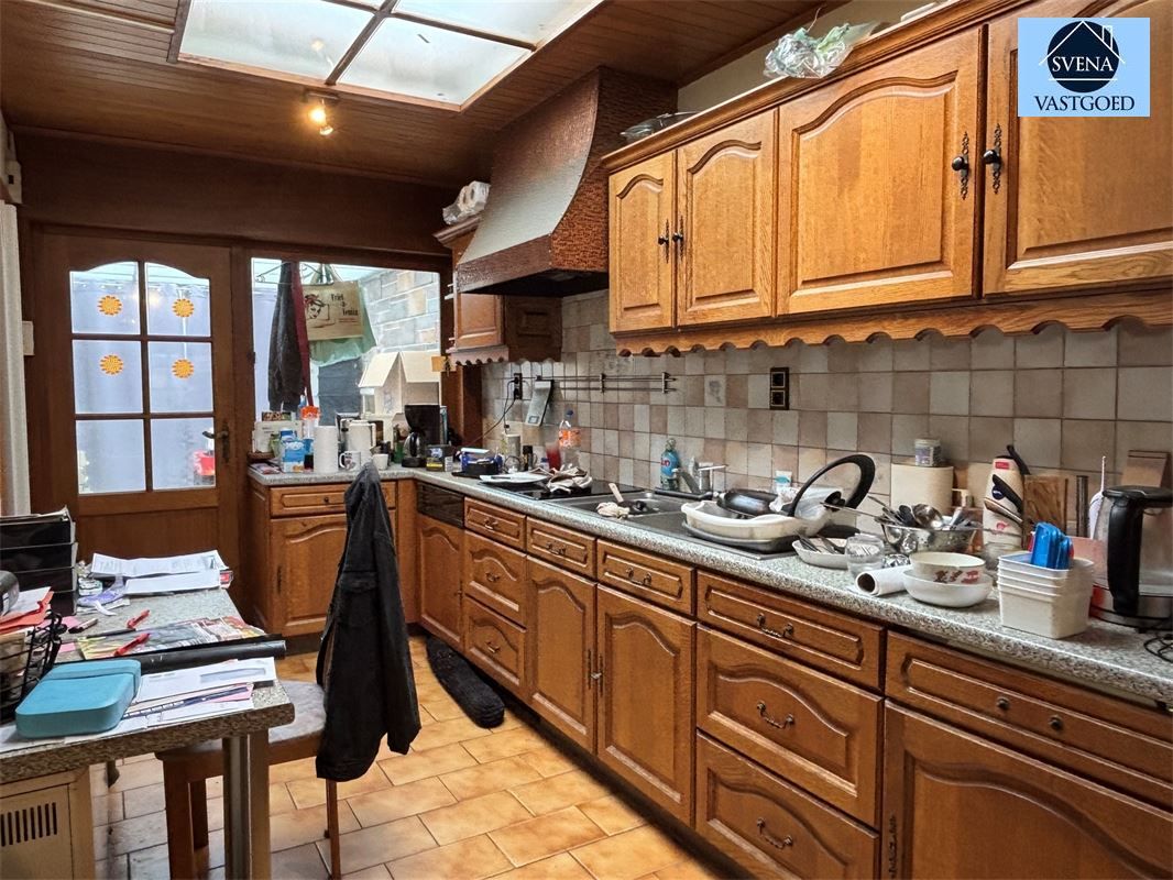 MOOIE WONING MET TUIN EN GARAGE foto 3