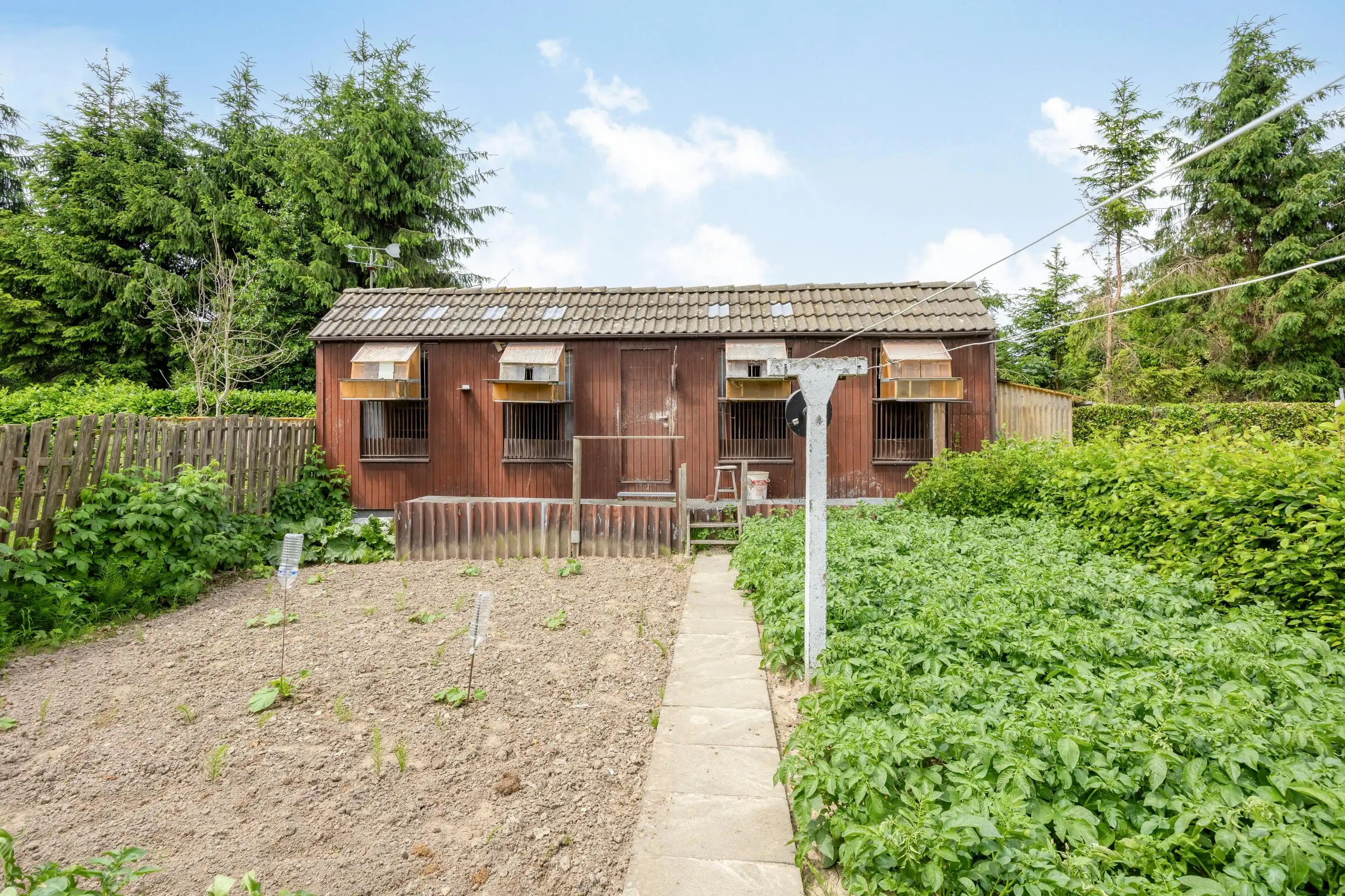 Te renoveren halfopen bebouwing met garage in Kruibeke  foto 16