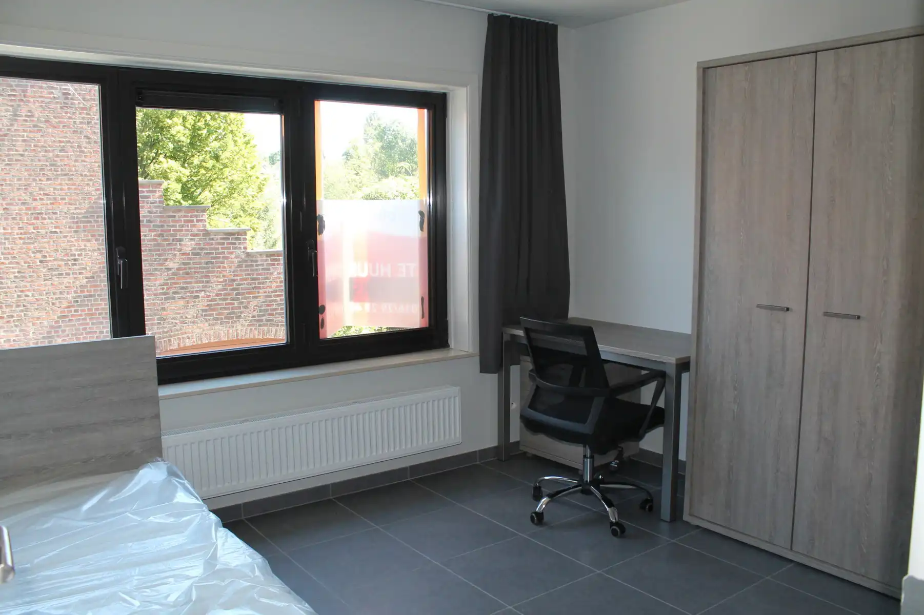 studentenkamer met douche foto 2