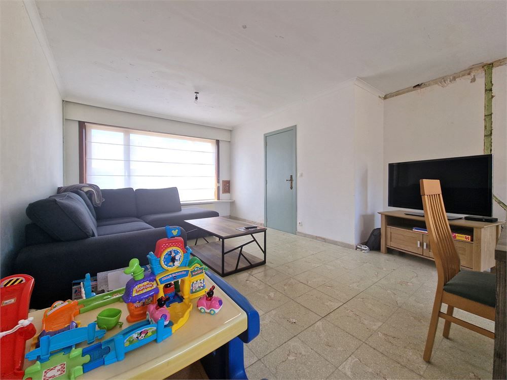 Halfopen te renoveren woning nabij centrum Pittem op een perceel van 348m²! foto 5