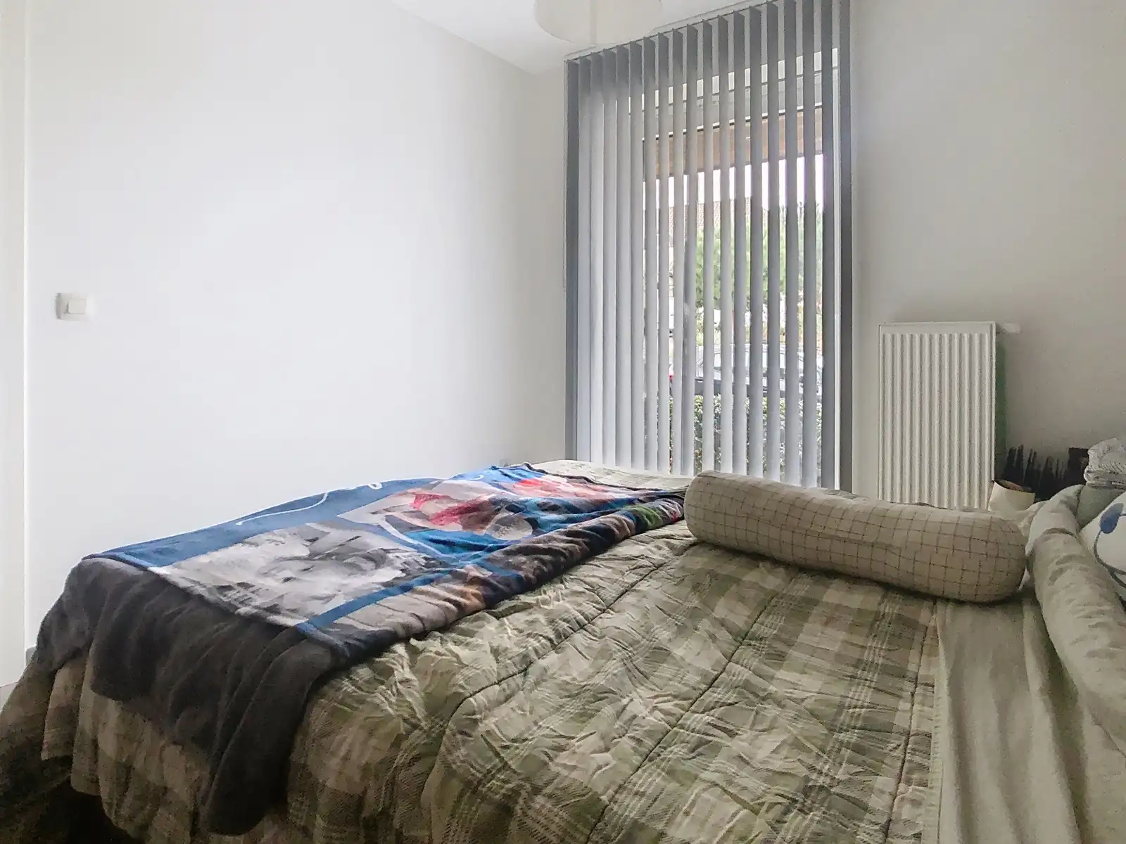 Gelijkvloers appartement met 2 slkrs, terras en staanplaats foto 9