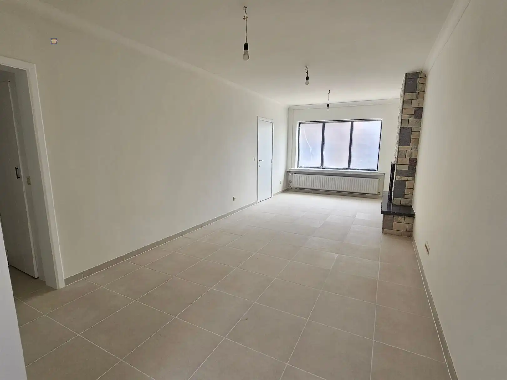 Recent gerenoveerde rijwoning met garage, tuin en 2 slaapkamers foto 4