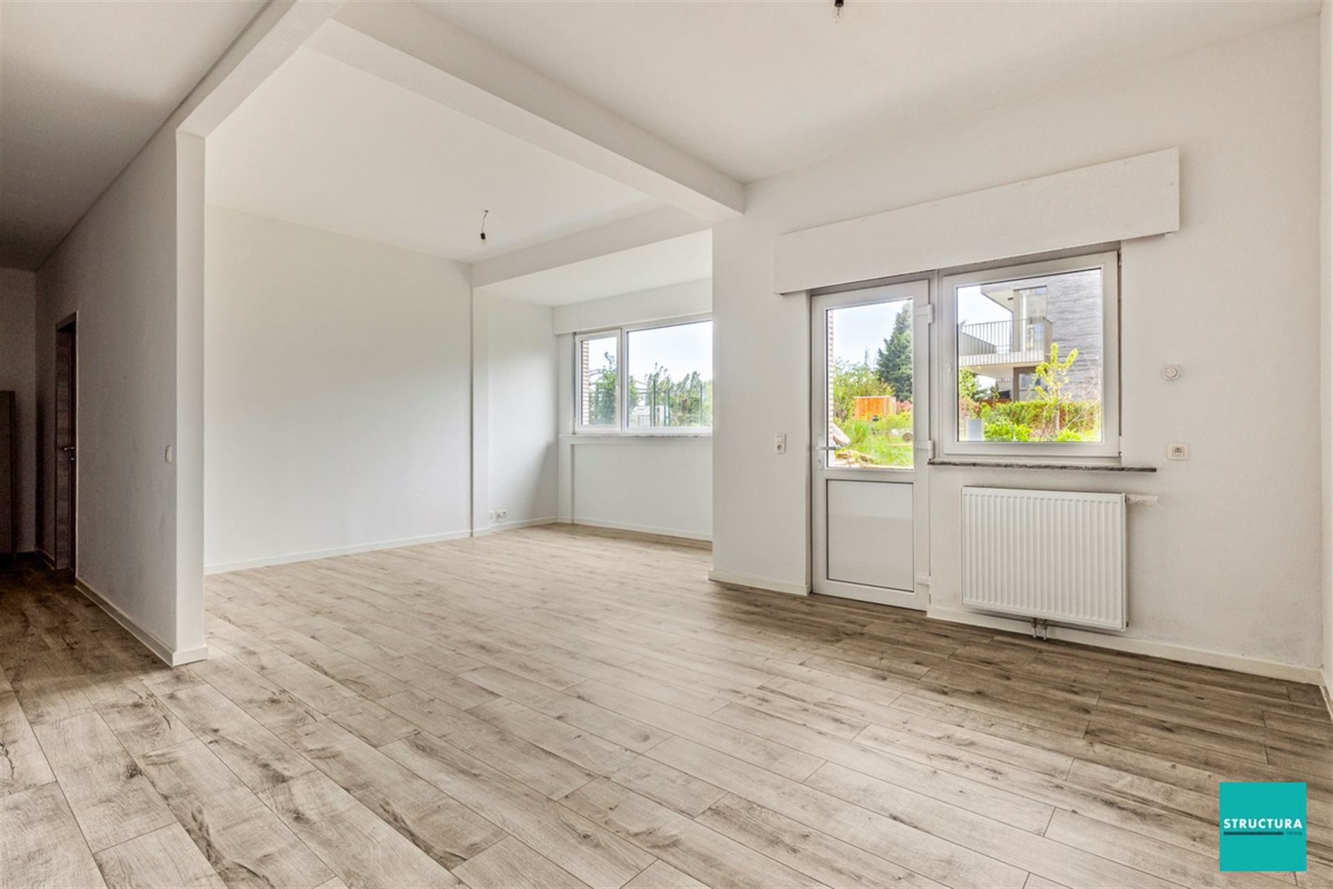 Gelijkvloers appartement met commerciële ruimte  foto 3