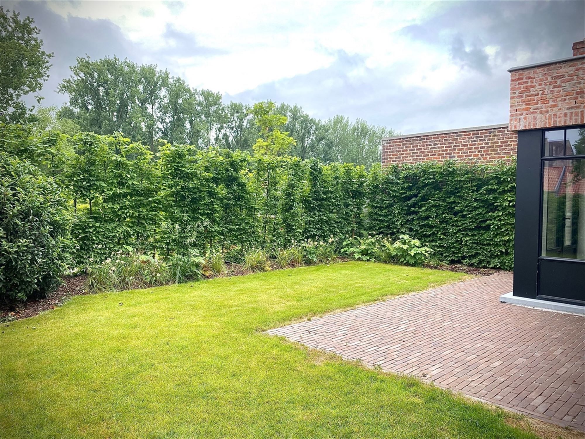 Charmante halfopen DORPSWONING met 3 SLAAPKAMERS, GARAGE, TUIN & ZONNIG TERRAS foto 7