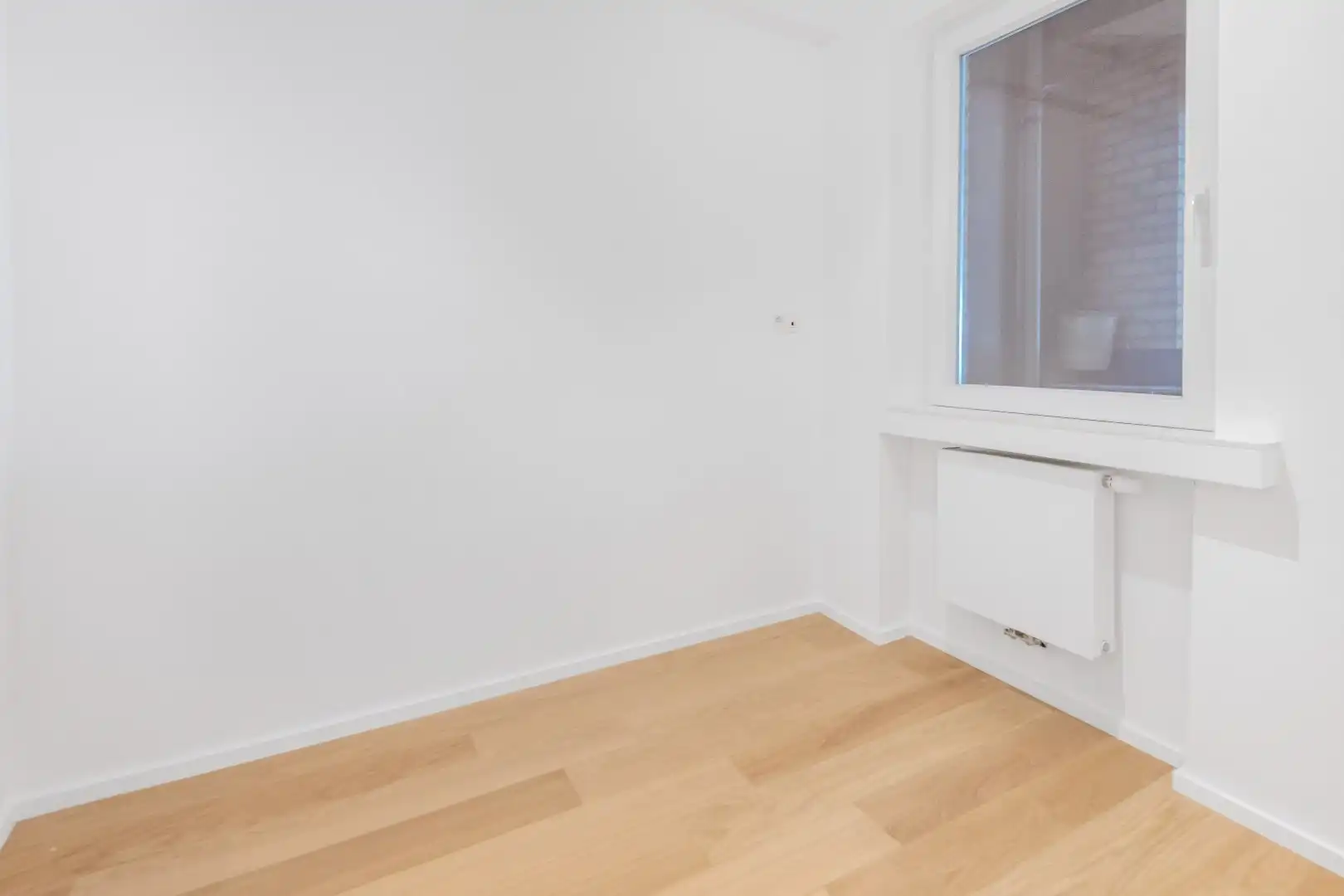 Ruim plateau-appartement met frontaal zeezicht (10 meter gevelbreedte) gelegen aan het Rubensplein. Inpandige parking. foto 21