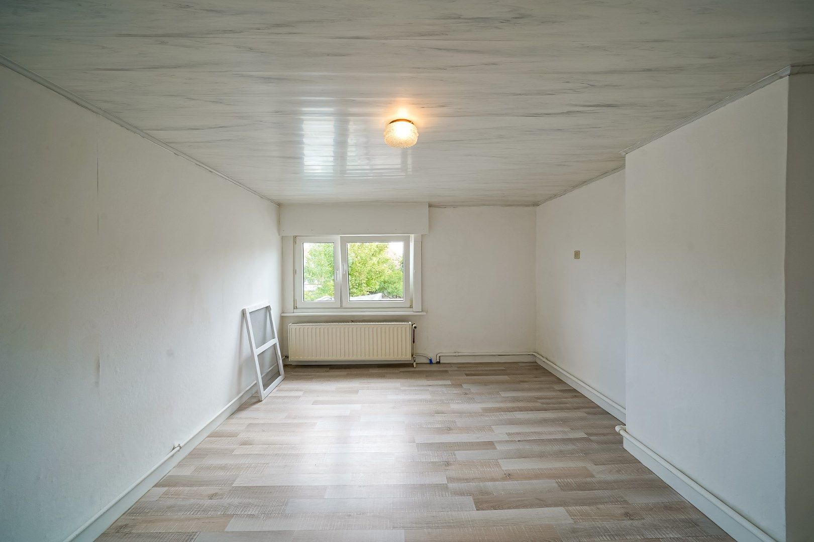 Rijwoning met 3 slaapkamers en tuin nabij de Spuikom foto 10