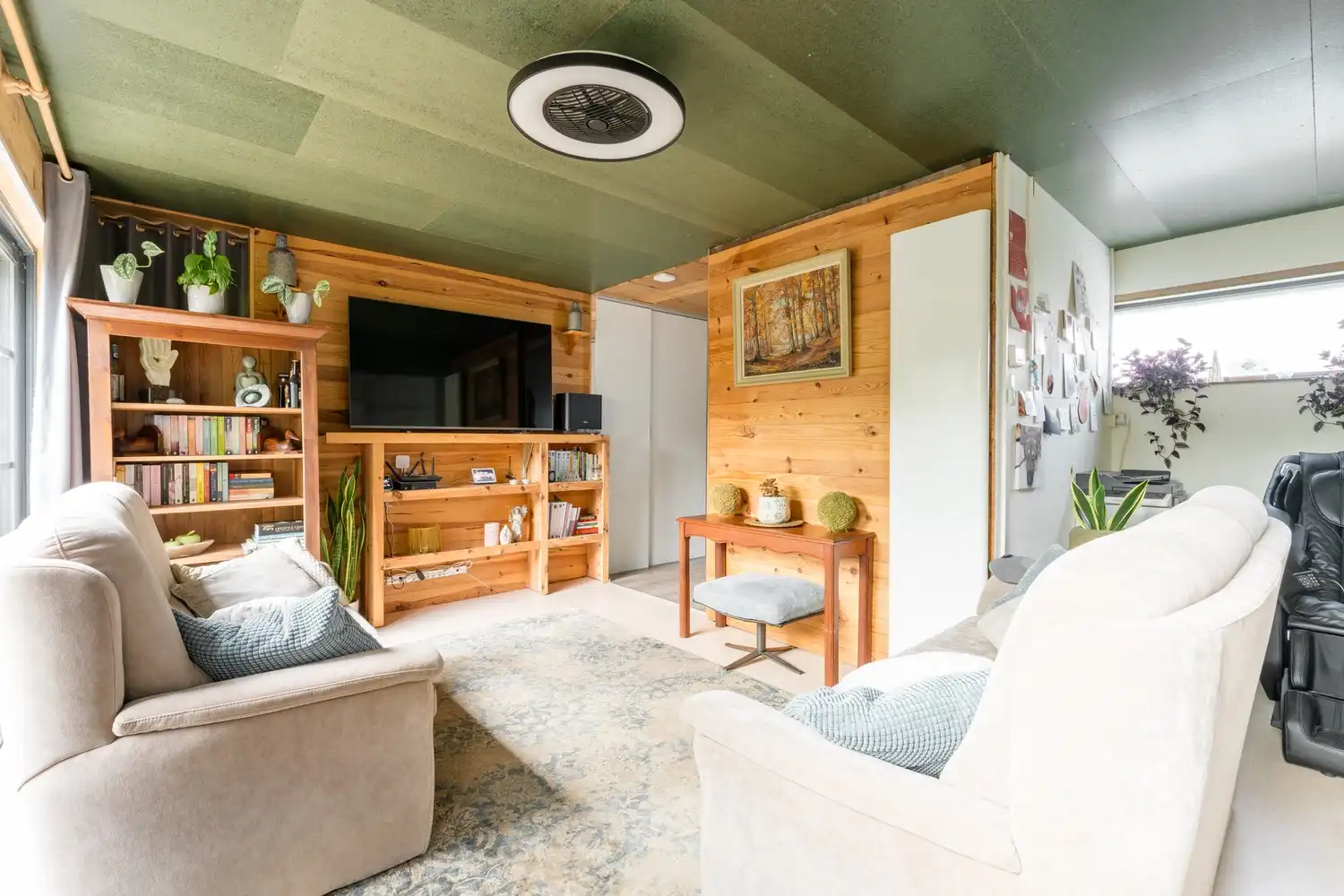 Veelzijdige woning met zorgmogelijkheden, werkruimte en tal van bijgebouwen foto 13