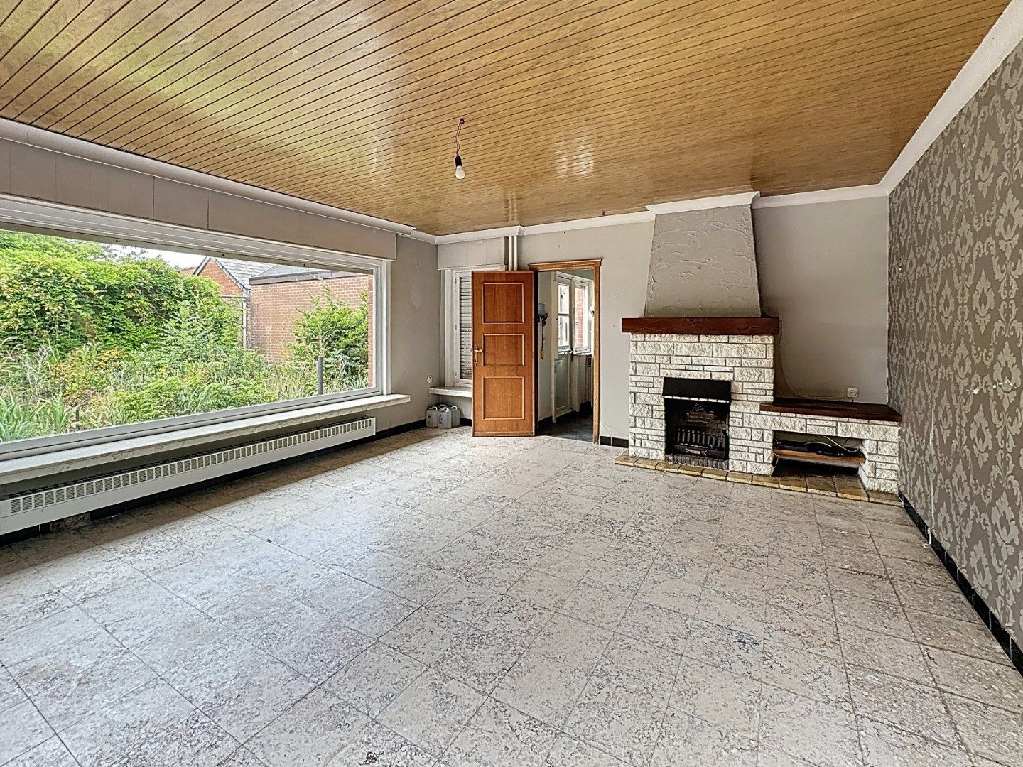 Te renoveren woning op afgesloten perceel van 936m² foto 3