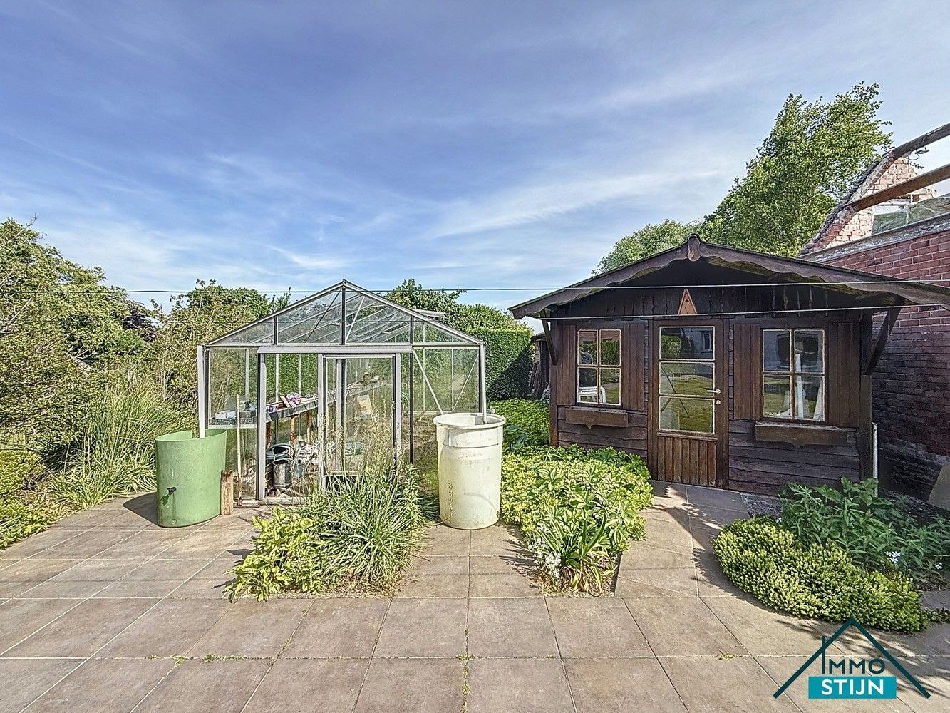 Woning met mooi aangelegde tuin foto 16