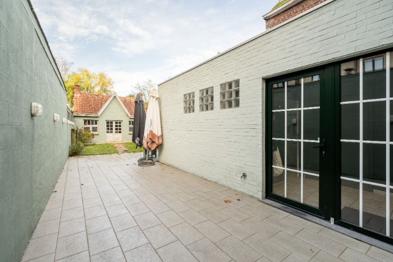 Commercieel handelspand met bovenliggende woonst op de Markt van Ingelmunster foto 22