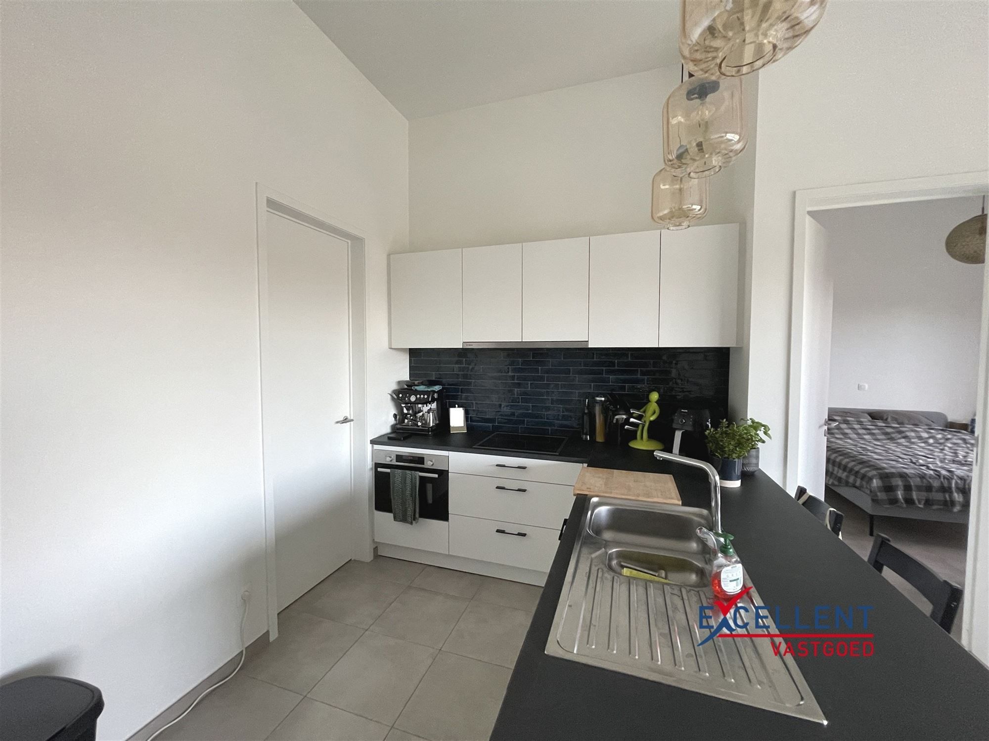 Energiezuinig gelijkvloers appartement te huur met zicht op de Leie! foto 7