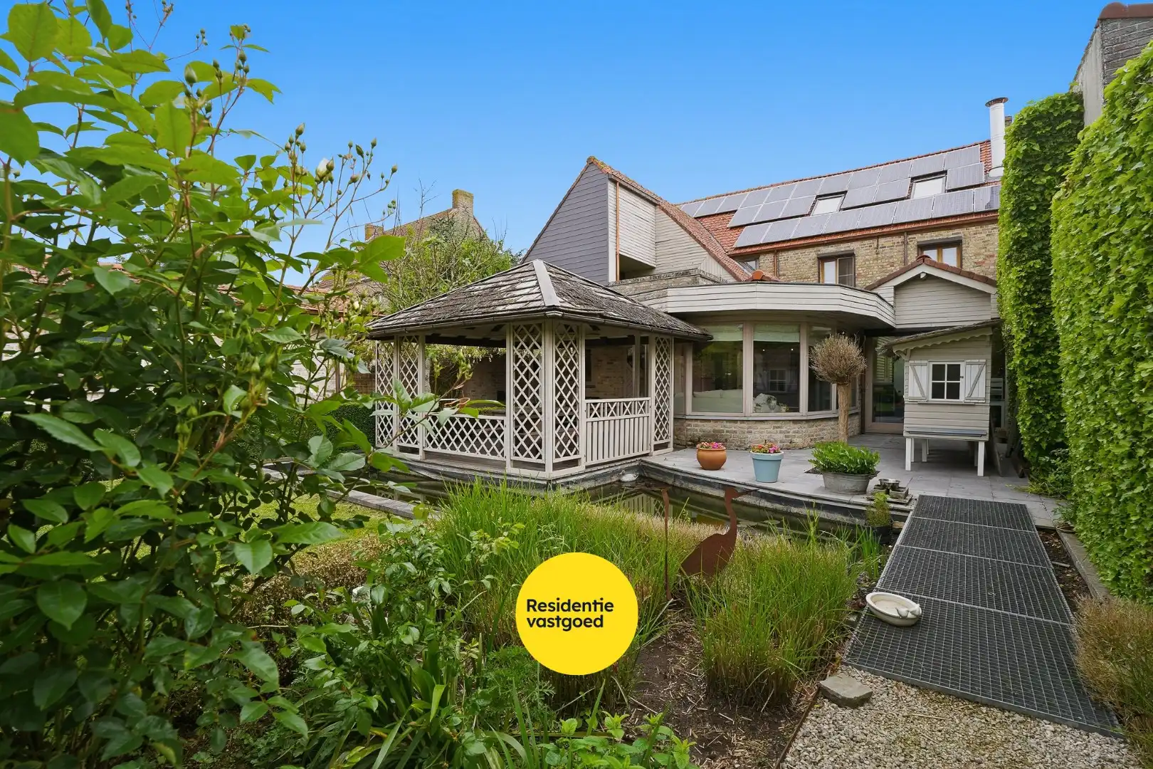 Unieke woning met polyvalente ruimte en zonnige tuin. foto 20