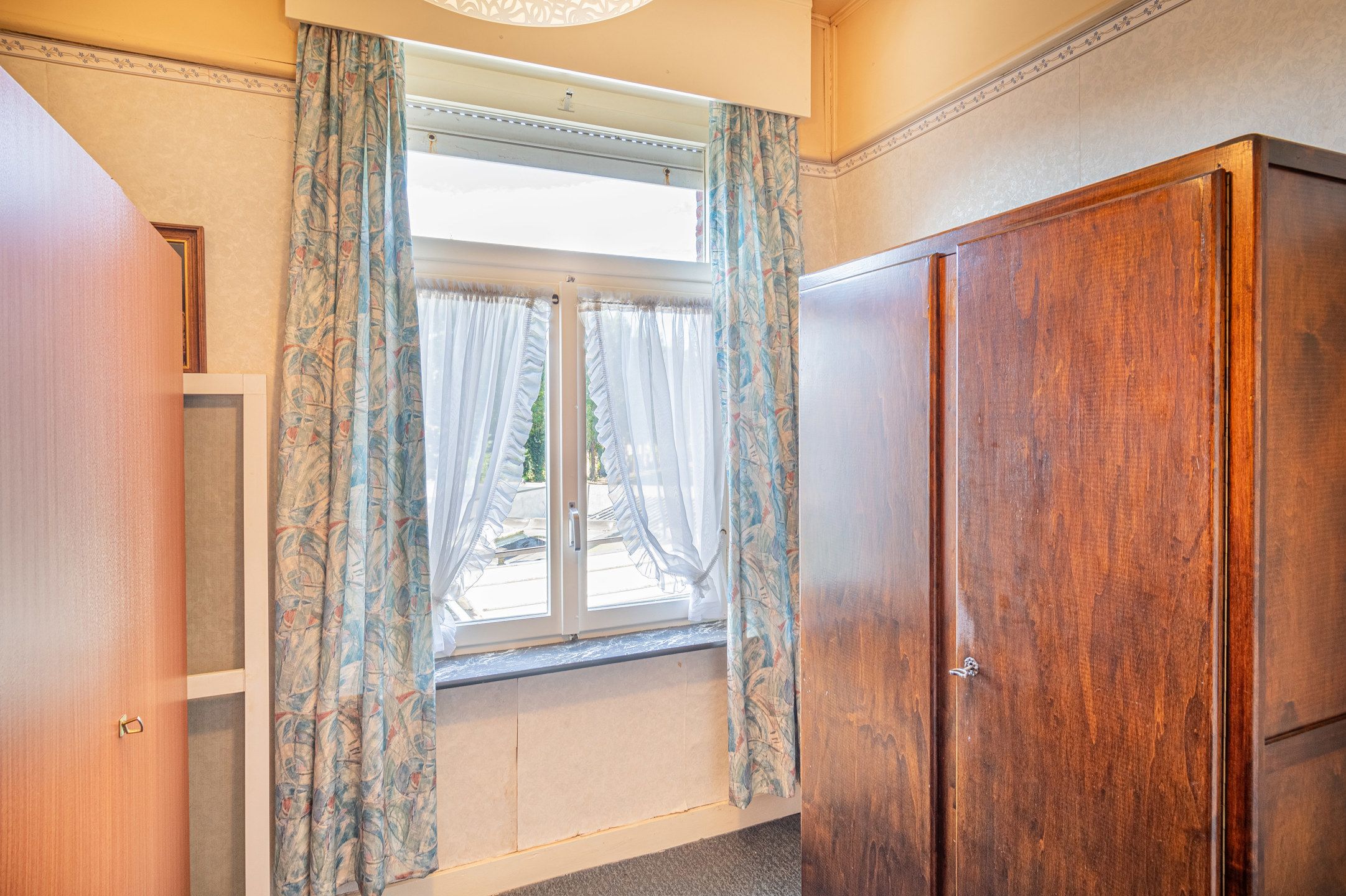 Knusse te renoveren woning met garage foto 14