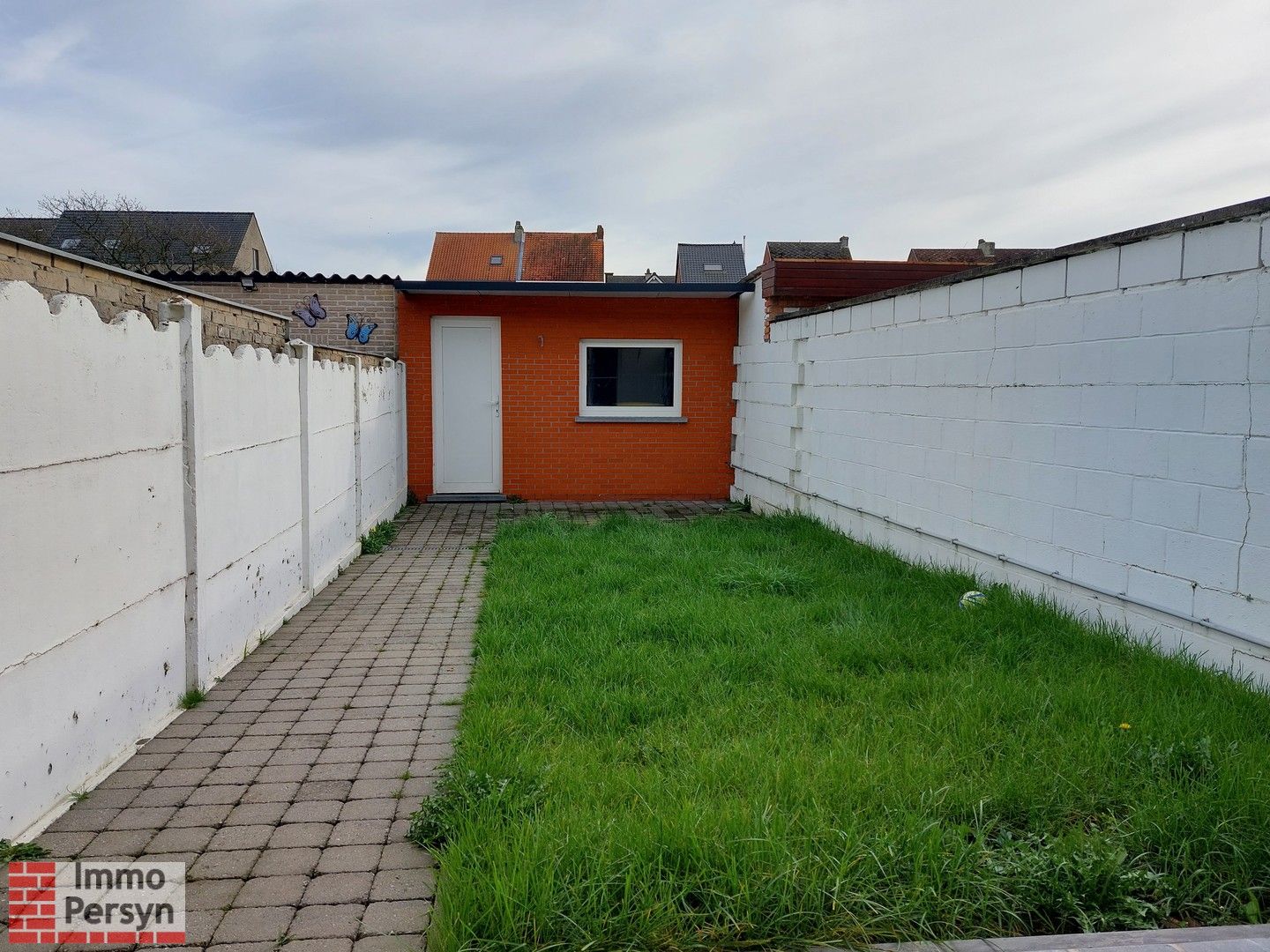 Gezellige rijwoning met kleine stadstuin foto 11