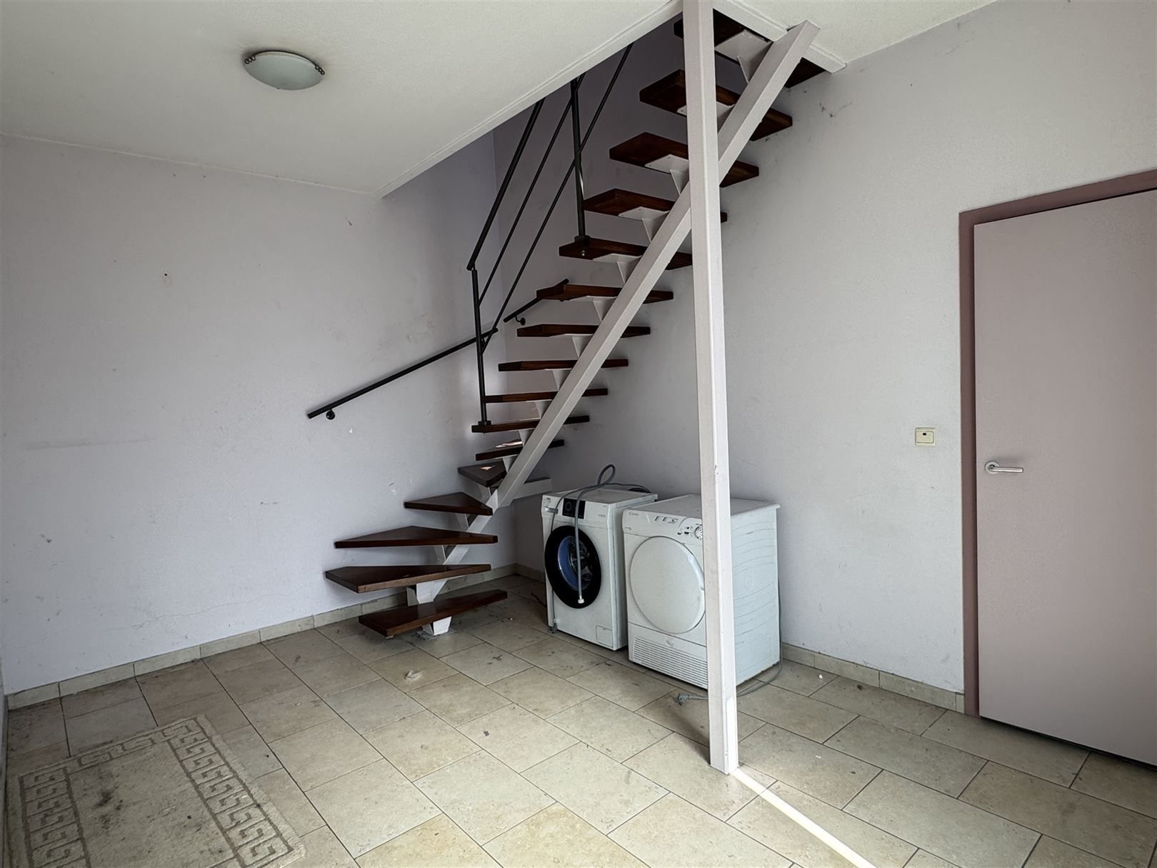 Ruime stapelwoning met 2 slaapkamers en garage foto 20