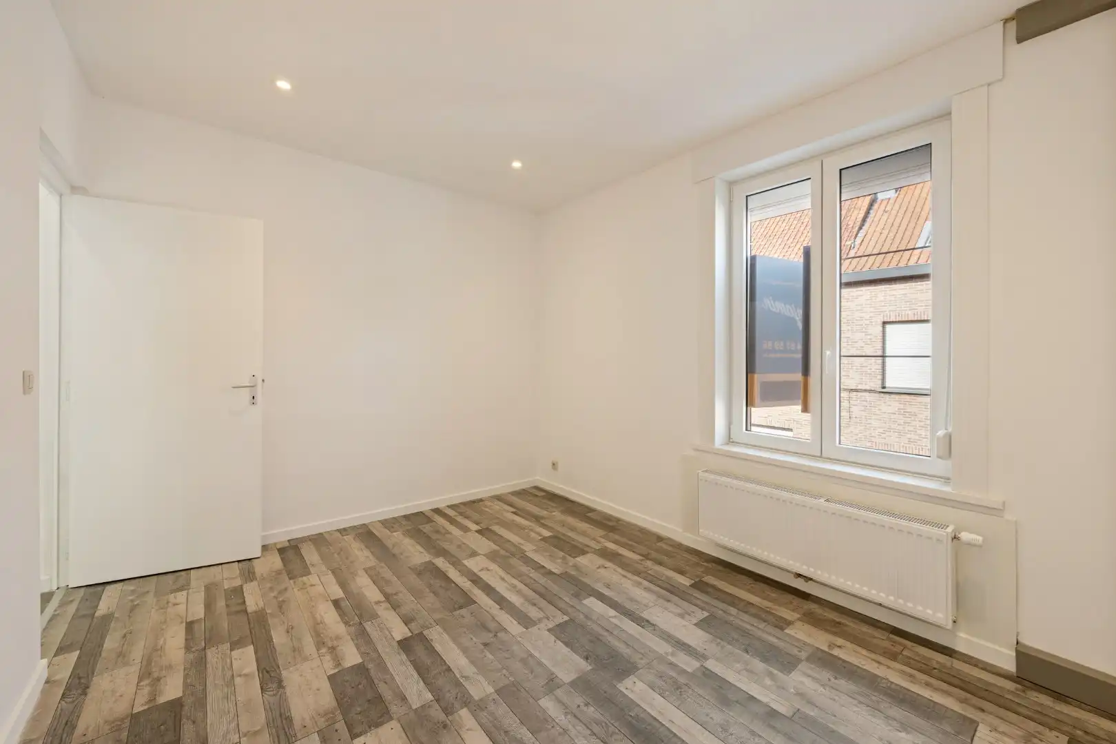 Rijwoning met 2 slaapkamers en ruime zolder in Menen foto 7