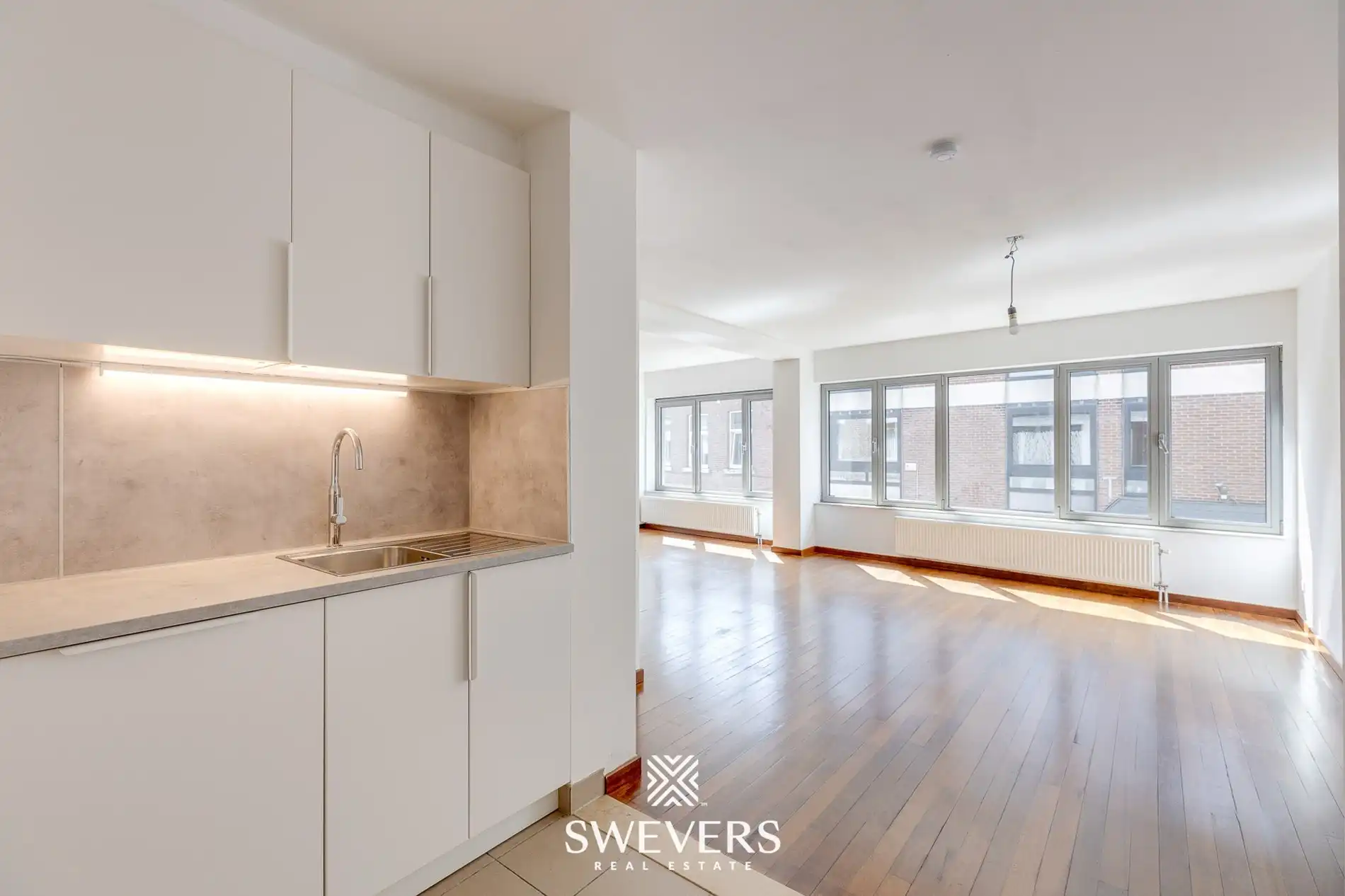 Ruim instapklare duplex-appartement met 3 slaapkamers en lift in centrum Hasselt foto 5