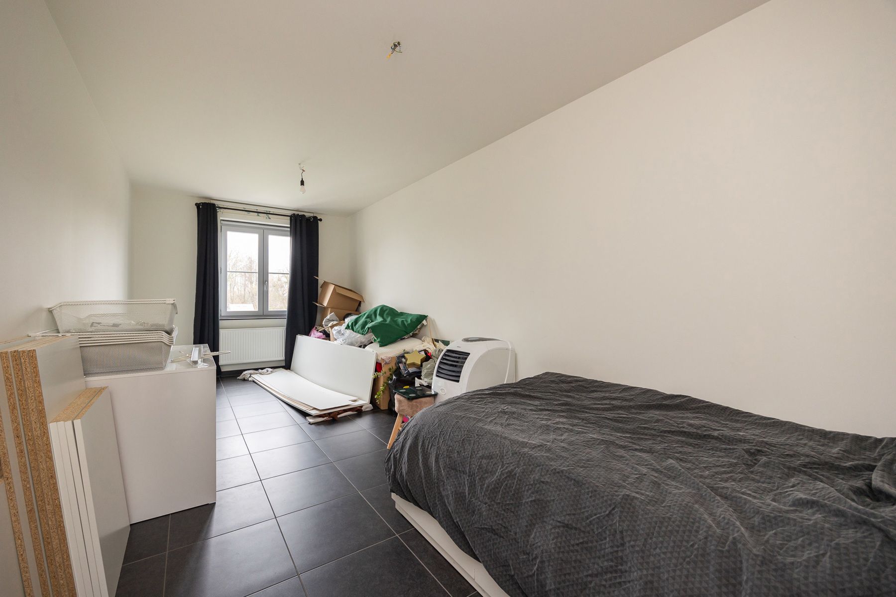 Verrassend ruime gezinswoning met terras, tuin en ondergrondse autostaanplaats. foto 10