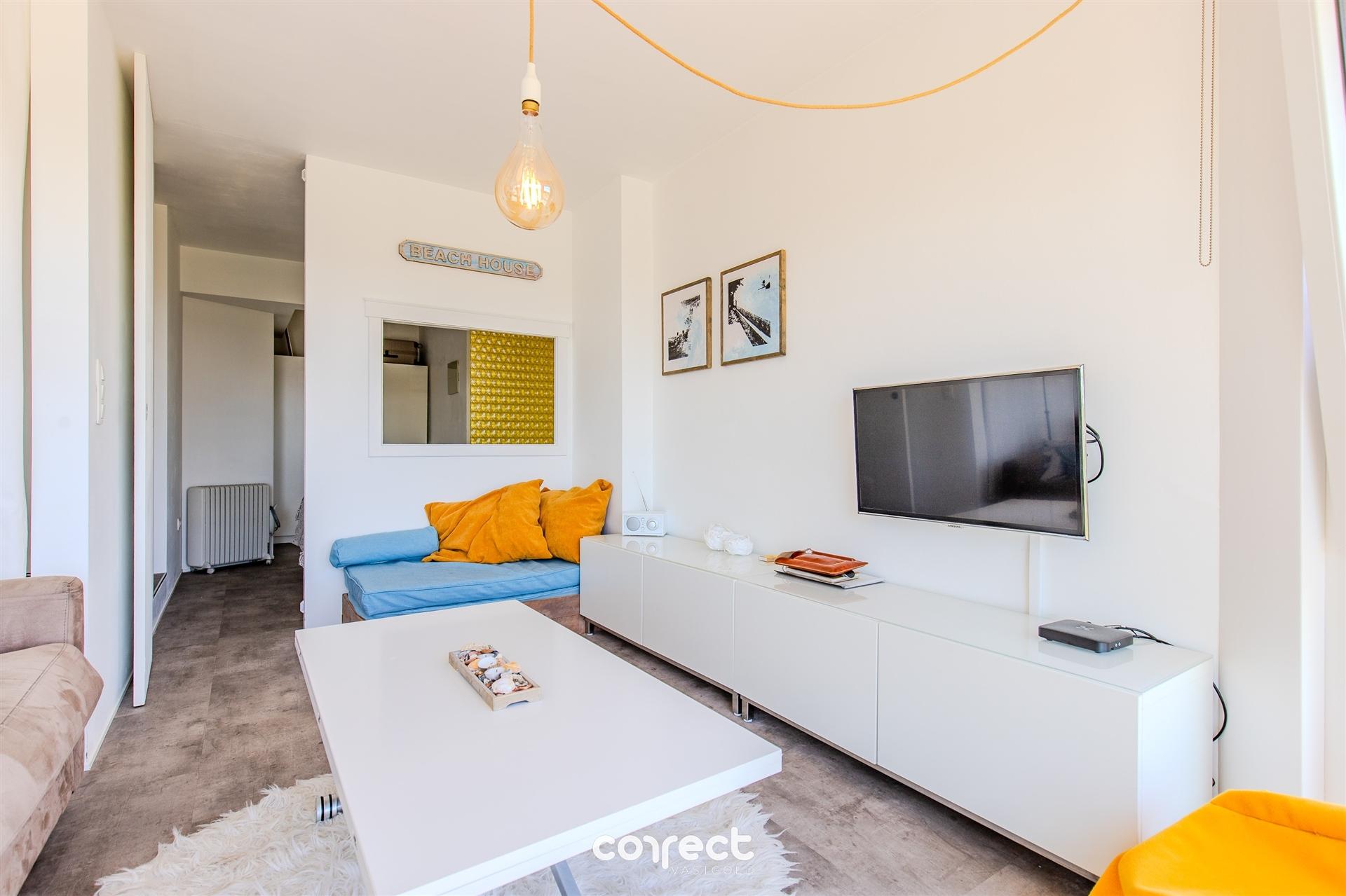 Modern halfopen woning te koop in hartje Oostduinkerke met 3 slaapkamers en diepe tuin foto 18