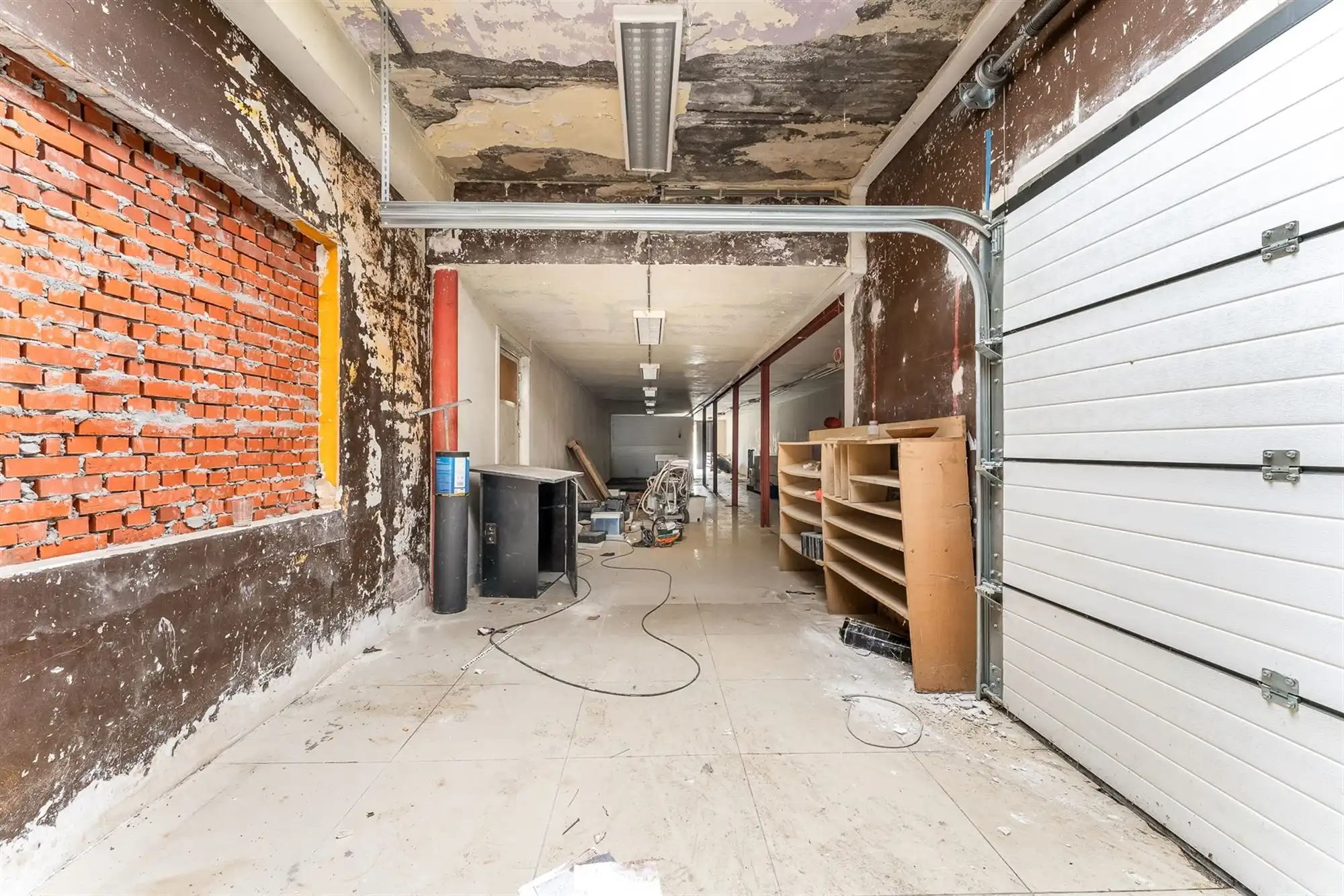 HANDELSHUIS MET RUIM HANDELSPAND EN 2 WOONENTITEITEN OP PERCEEL VAN 9A68CA TE KOERSEL foto 10