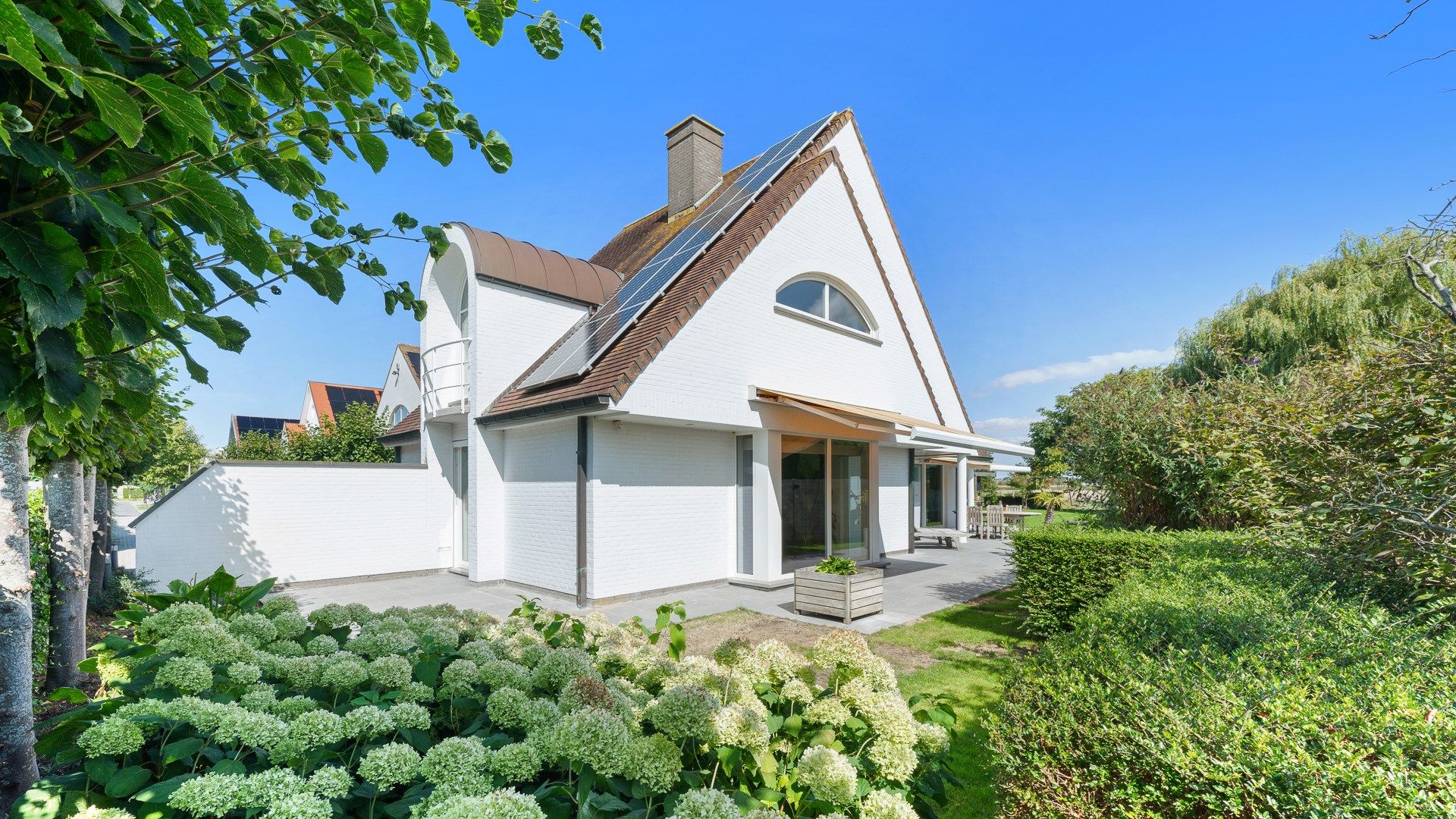 Schitterende villa op een uniek perceel (1362 m²) te Heist foto {{pictureIndex}}
