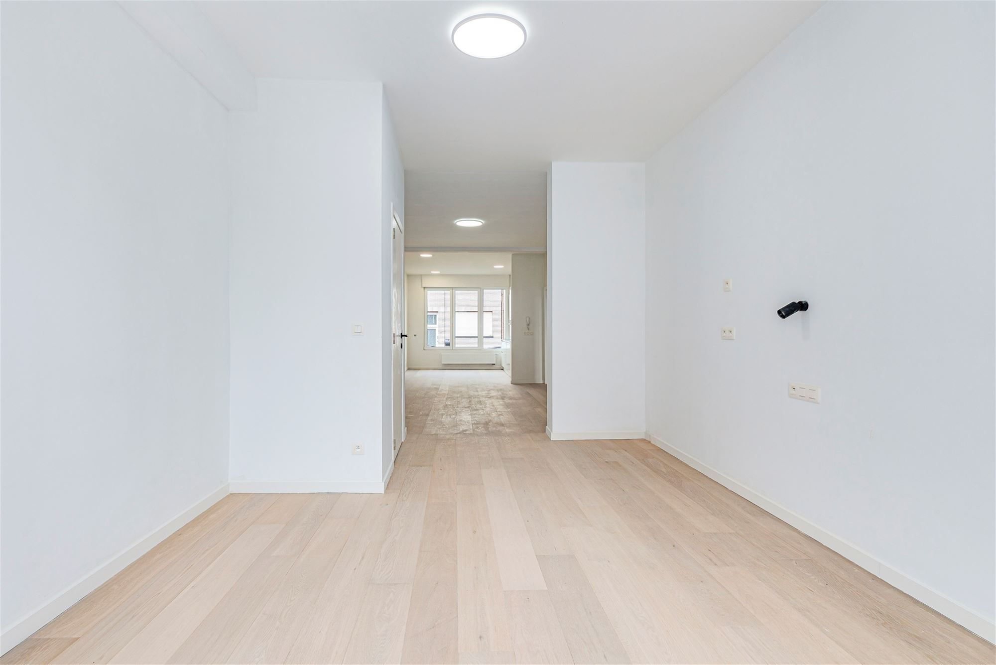 Gelijkvloers duplexappt met 3 slk + tuin foto 10