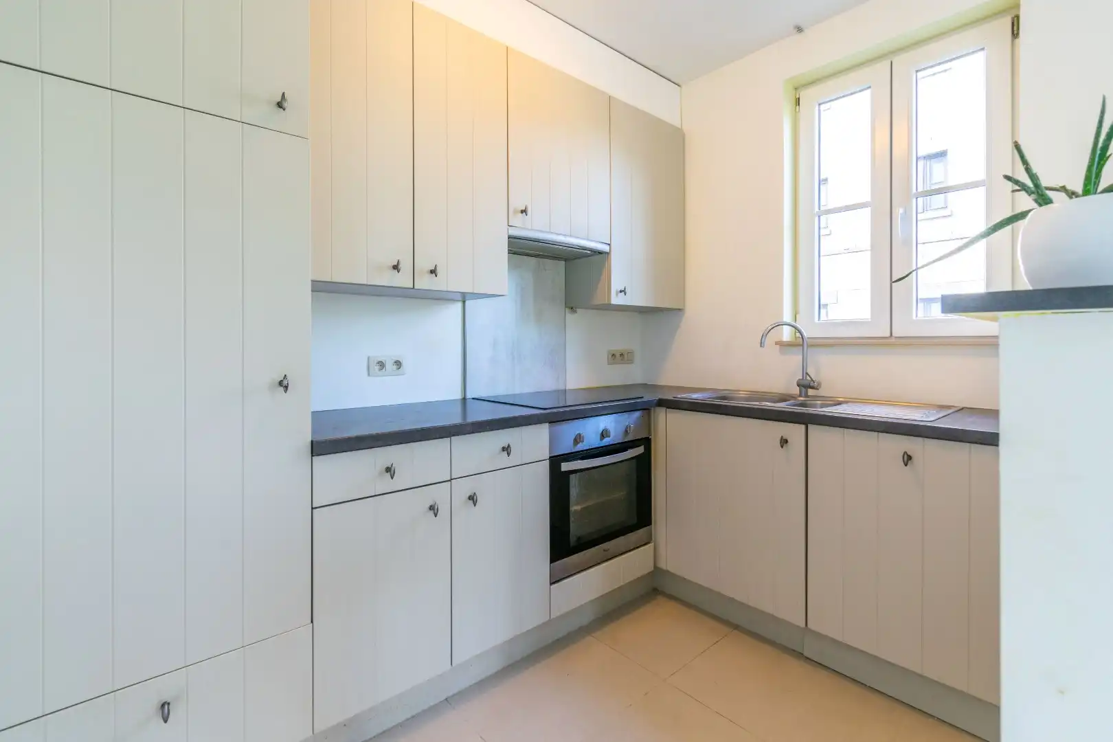 Een aangenaam gelijkvloers appartement te Halle! foto 8